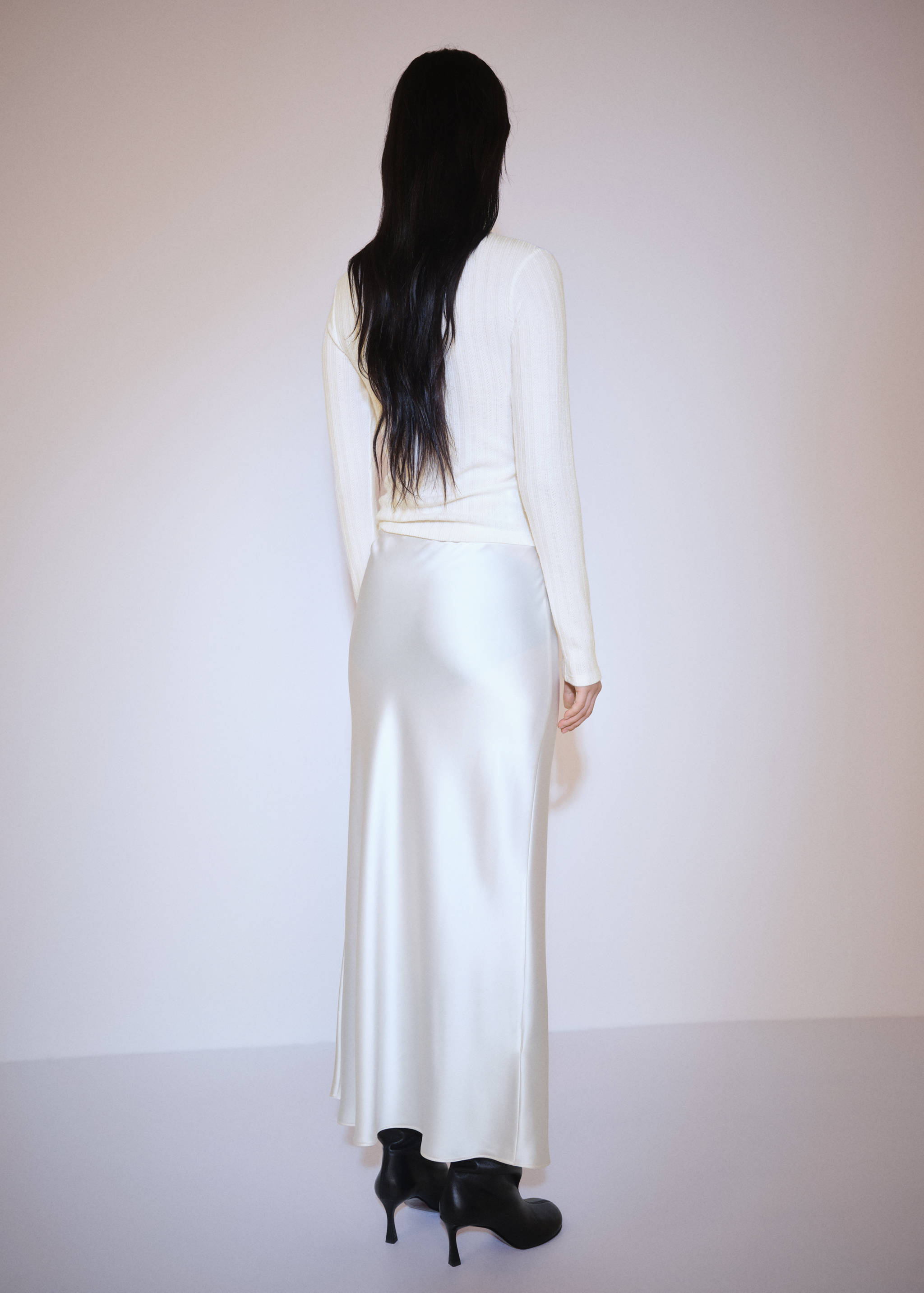 Stickad tröja dragkedja - Artikelns baksida