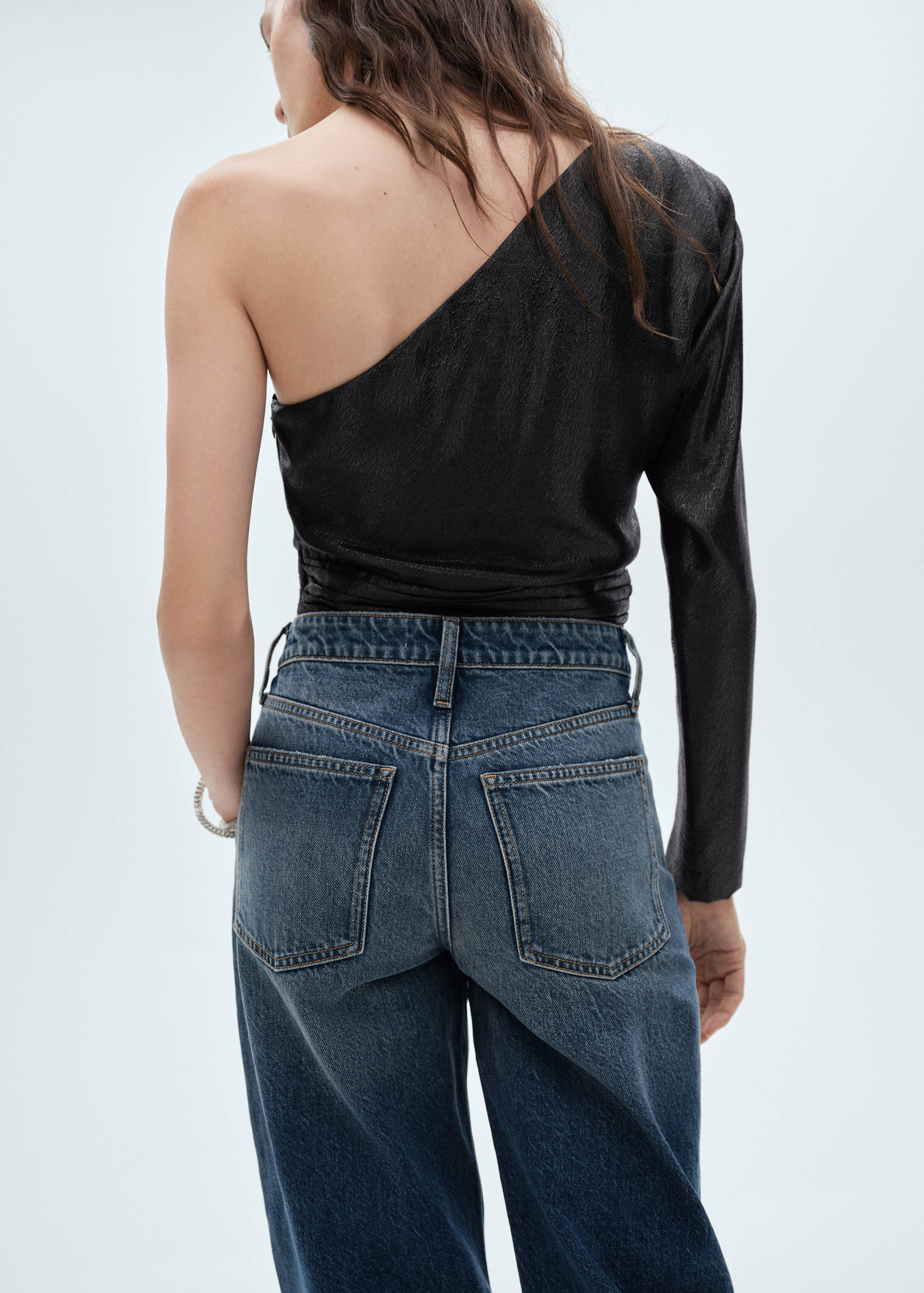 Blusa asimmetrica maniche a palloncino - Retro dell'articolo