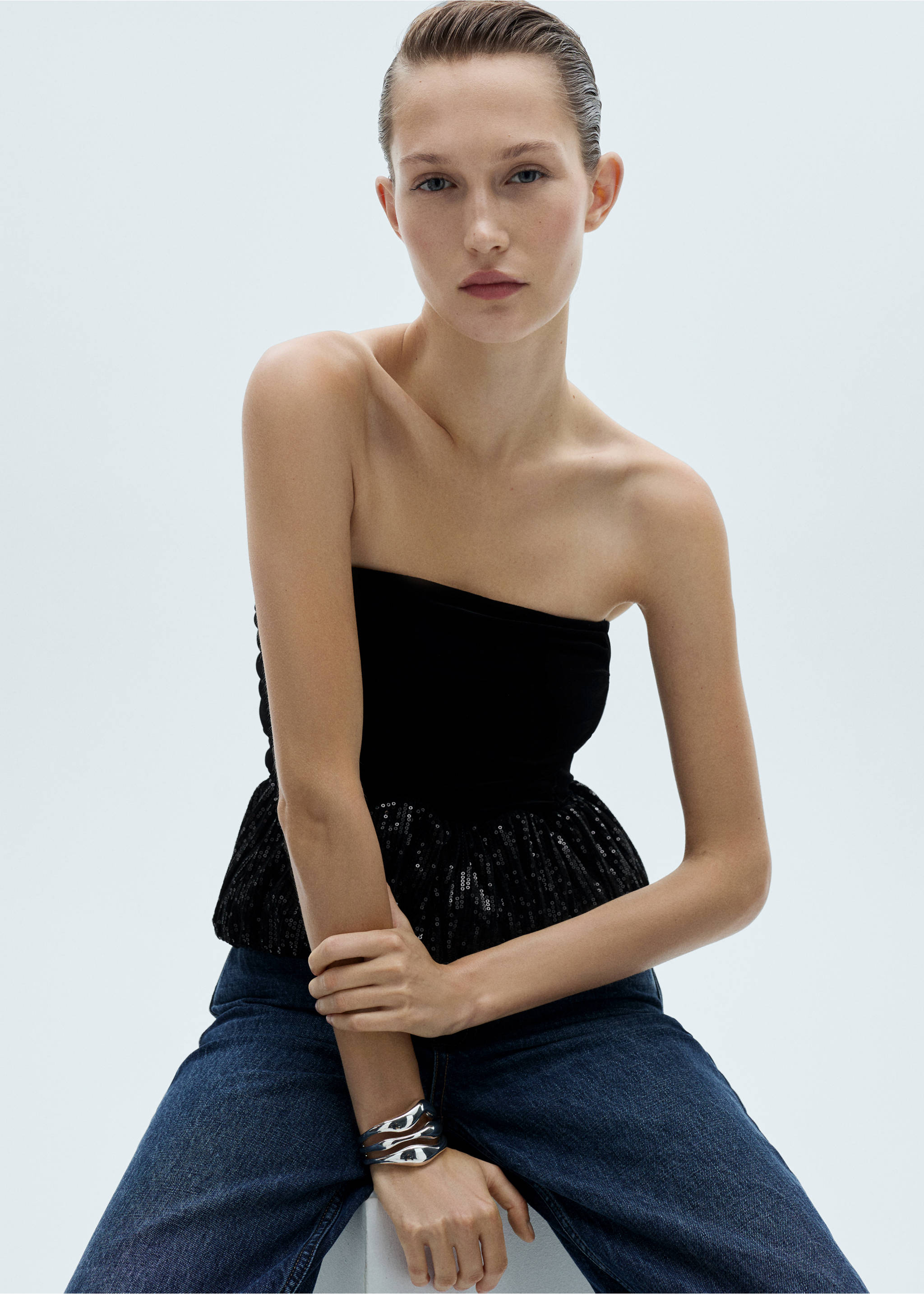 Peplum-Top mit Paillettenbesatz - Mittlere Ansicht, Schwarz. Ref: 77089057-00.