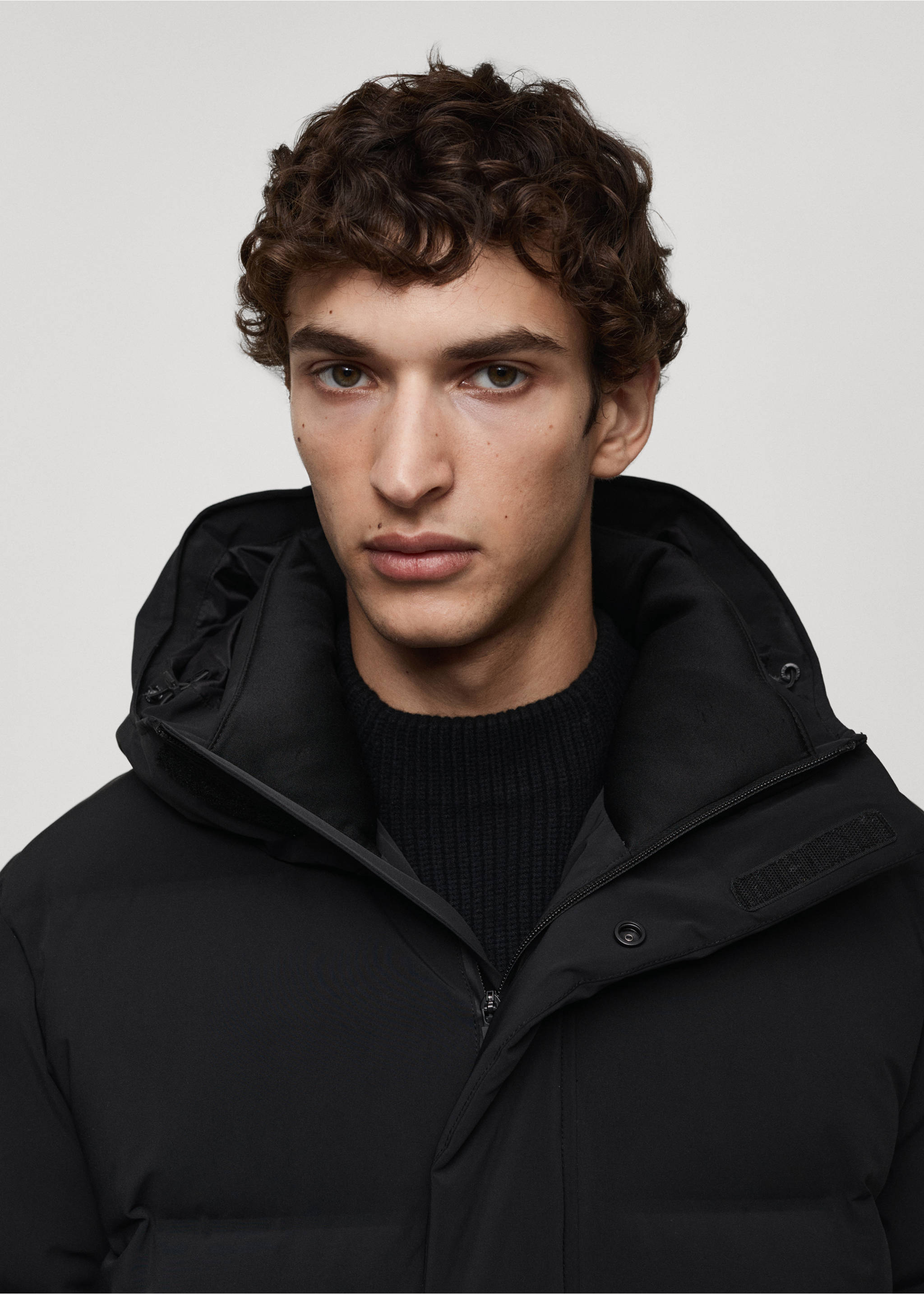 Long waterproof anorak with down and feather filling - Details of the article 1, Black. Ref: 77089226-00.