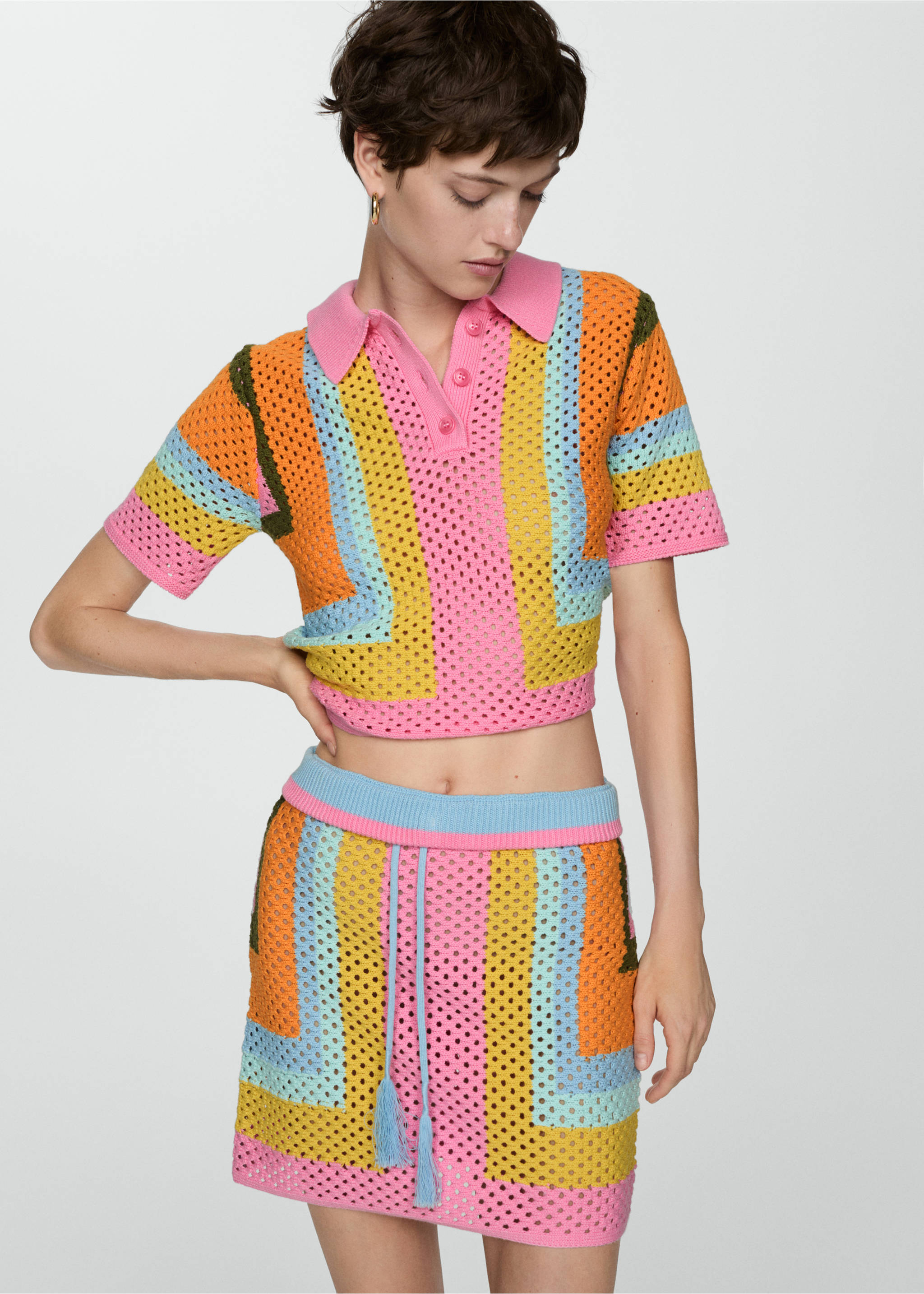 Crochet mini-skirt with bow fastening - Details of the article 1, Pink. Ref: 77090338-00.