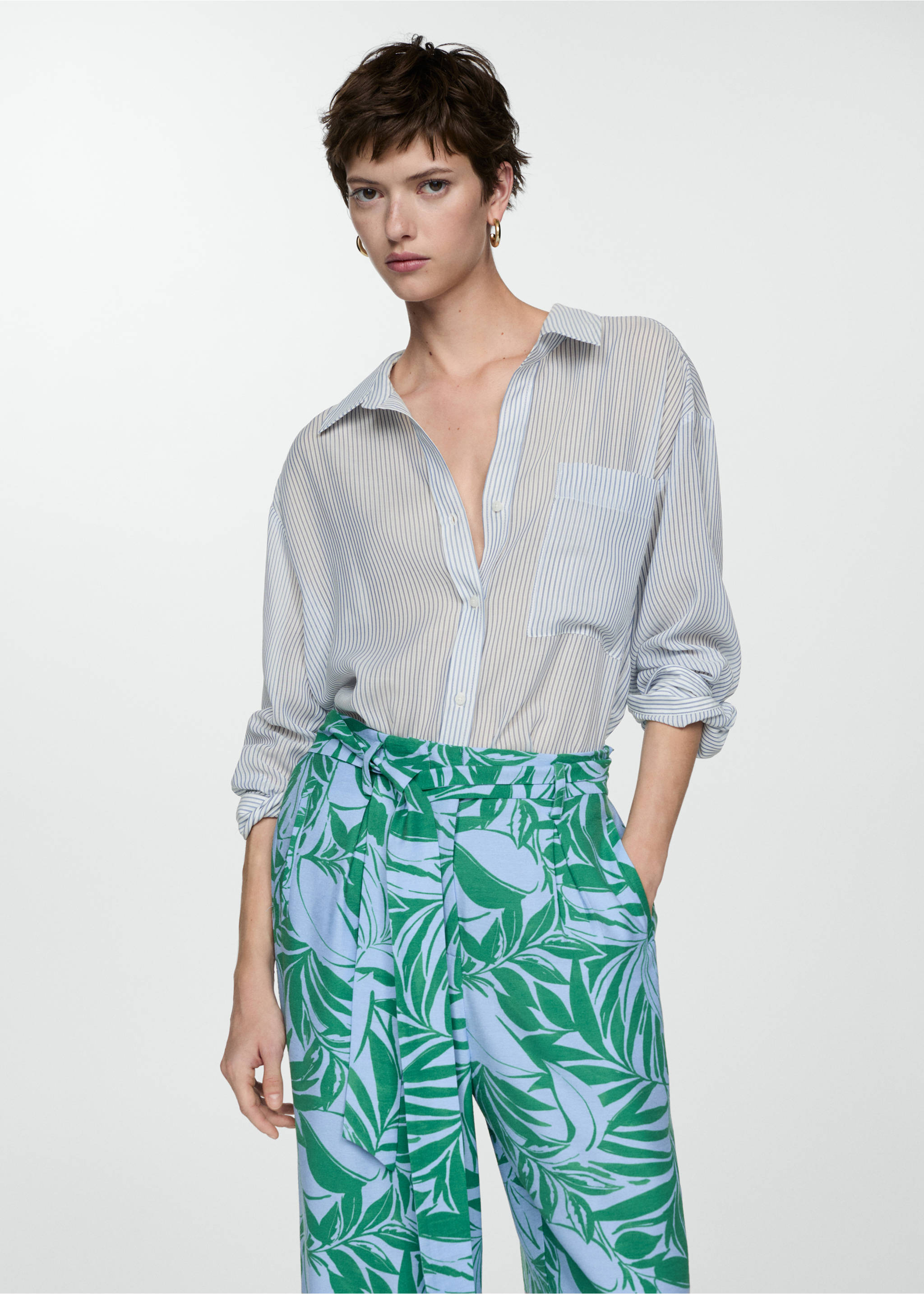 Printed trousers with bow - Details of the article 1, Green. Ref: 77090352-00.