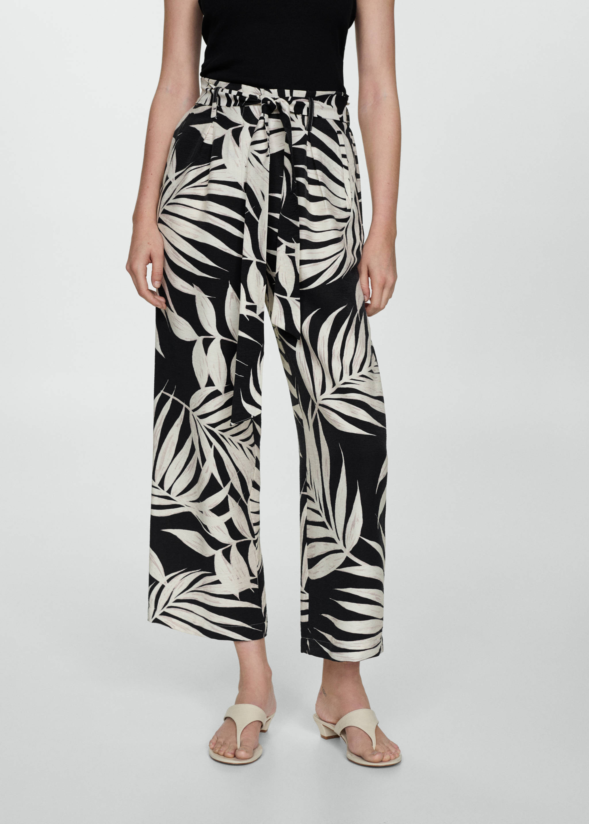 Calças estampadas com laço - Plano médio