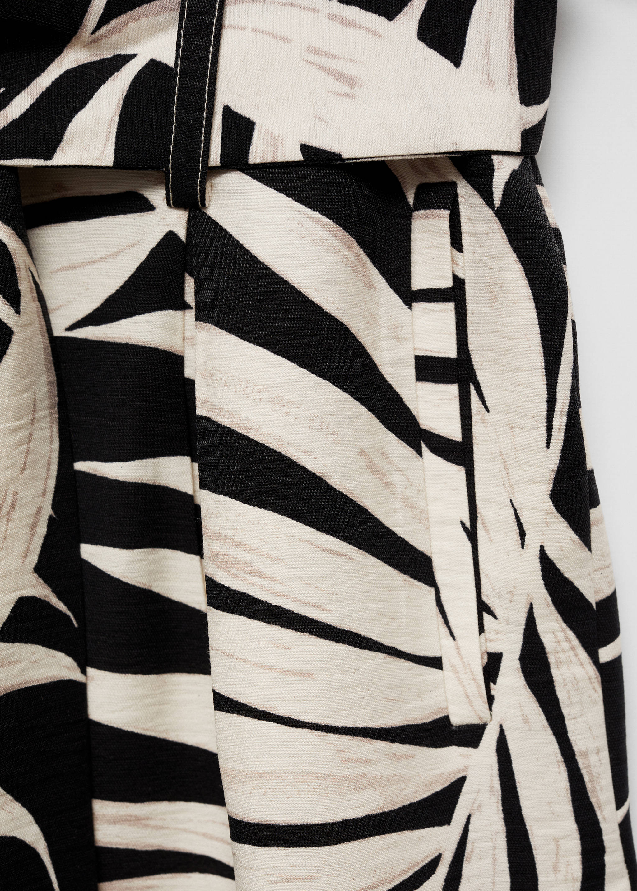 Calças estampadas com laço - Pormenor do artigo 8