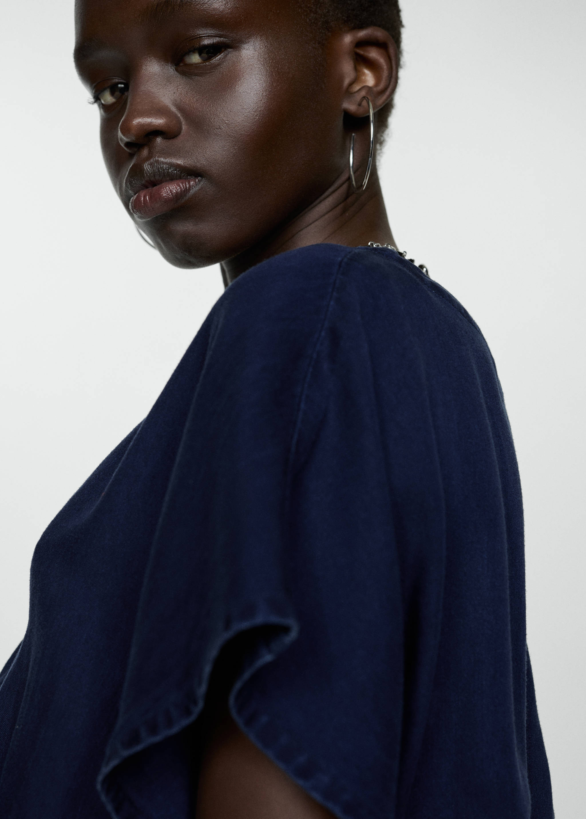 Kombinezon z krótkimi nogawkami i paskiem - Szczegóły artykułu 1