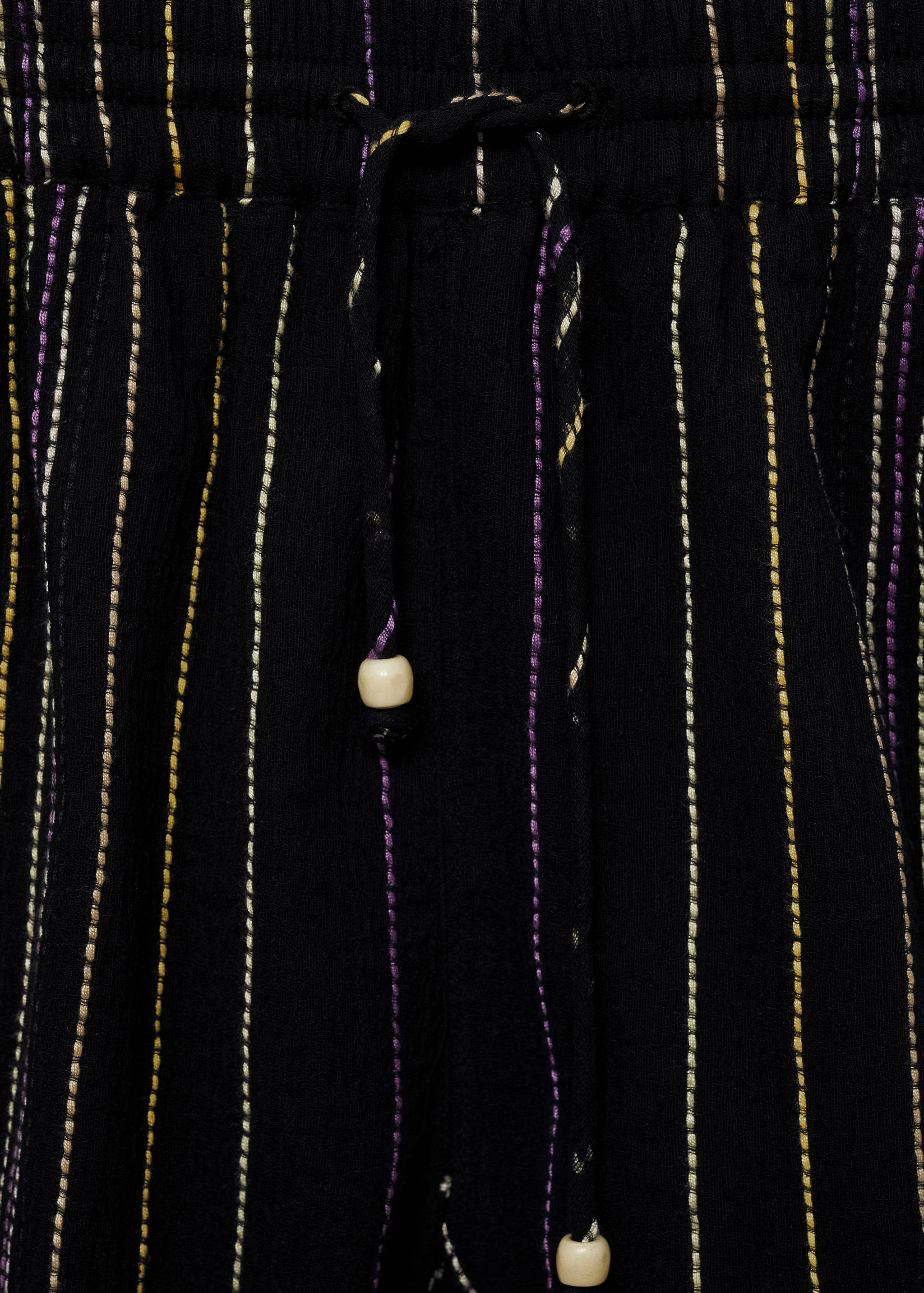 Striped trousers with frayed hem - Details of the article 8