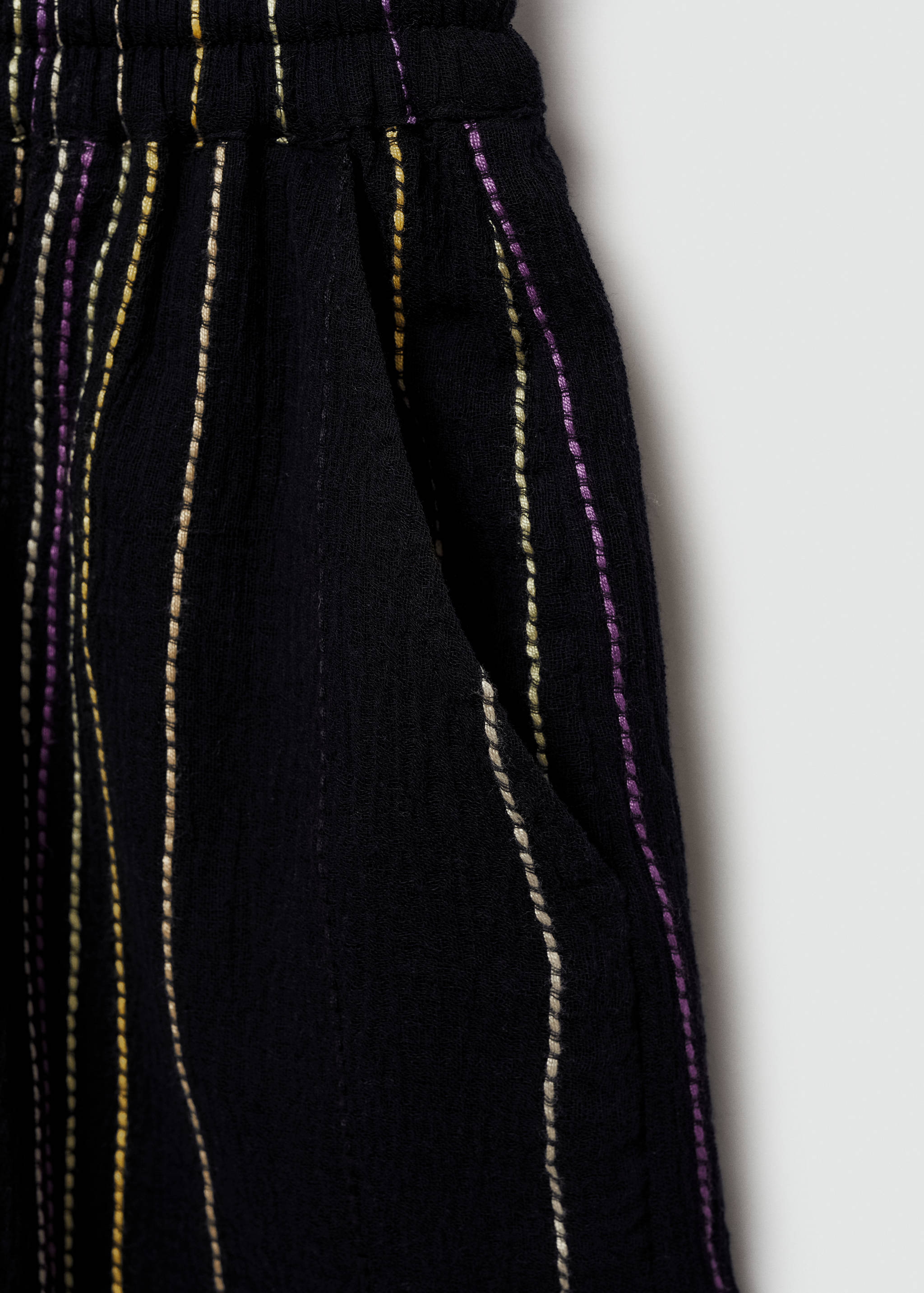 Striped trousers with frayed hem - Details of the article 0