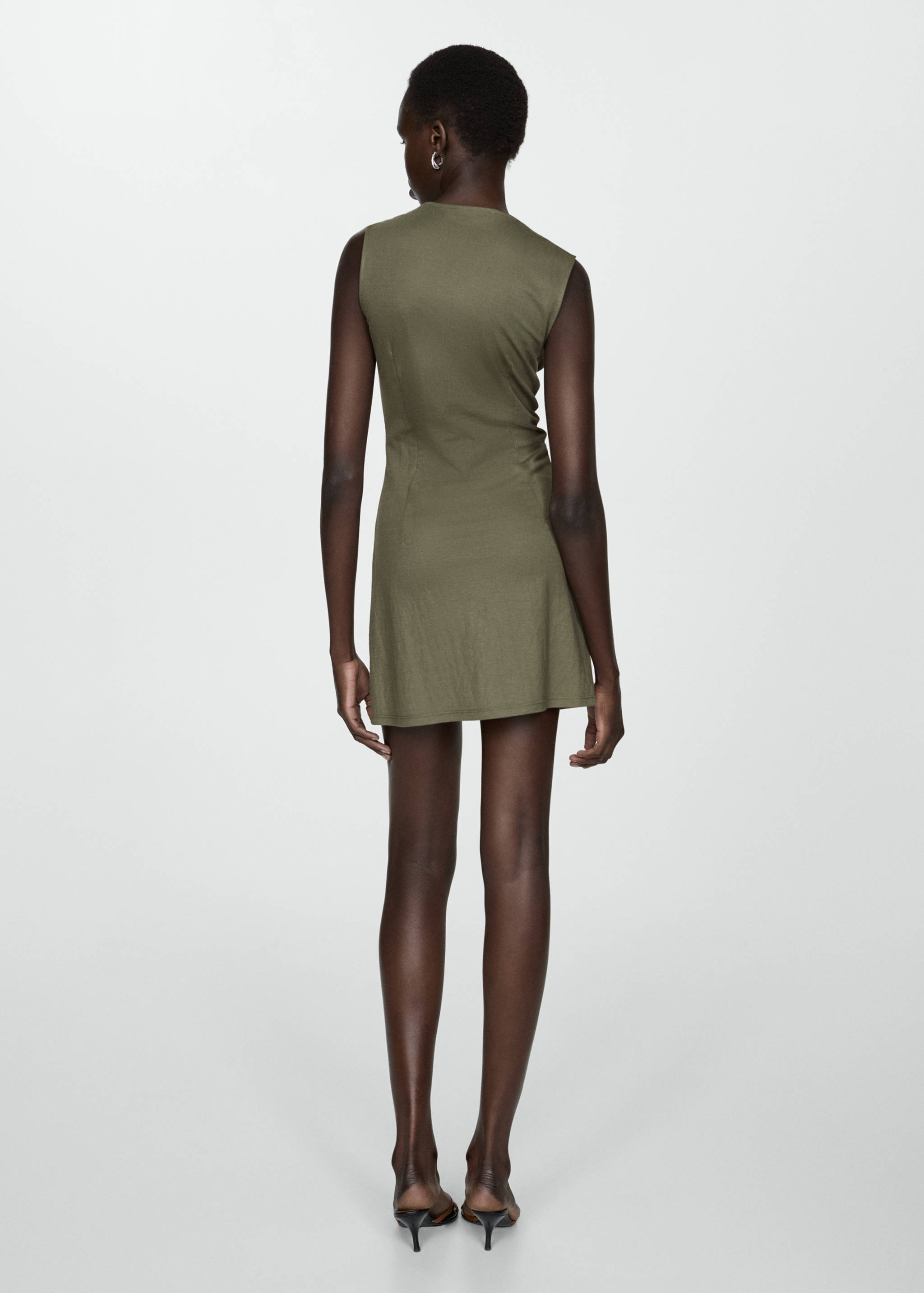 Kurzes Kleid mit Knöpfen - Rückseite des Artikels