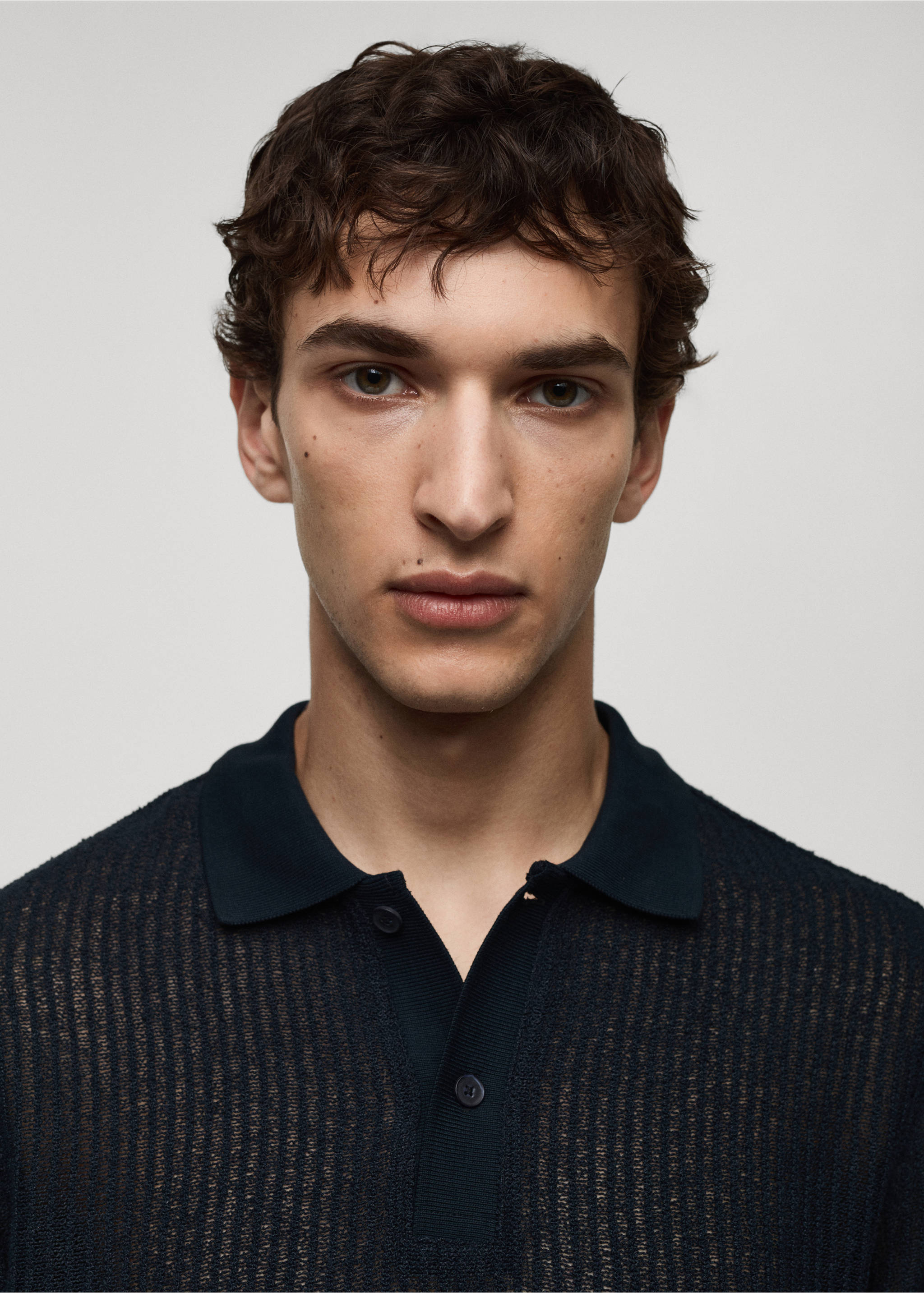 Regular-fit openwork knitted polo shirt - Details of the article 1, Dark Navy. Ref: 77090587-00.