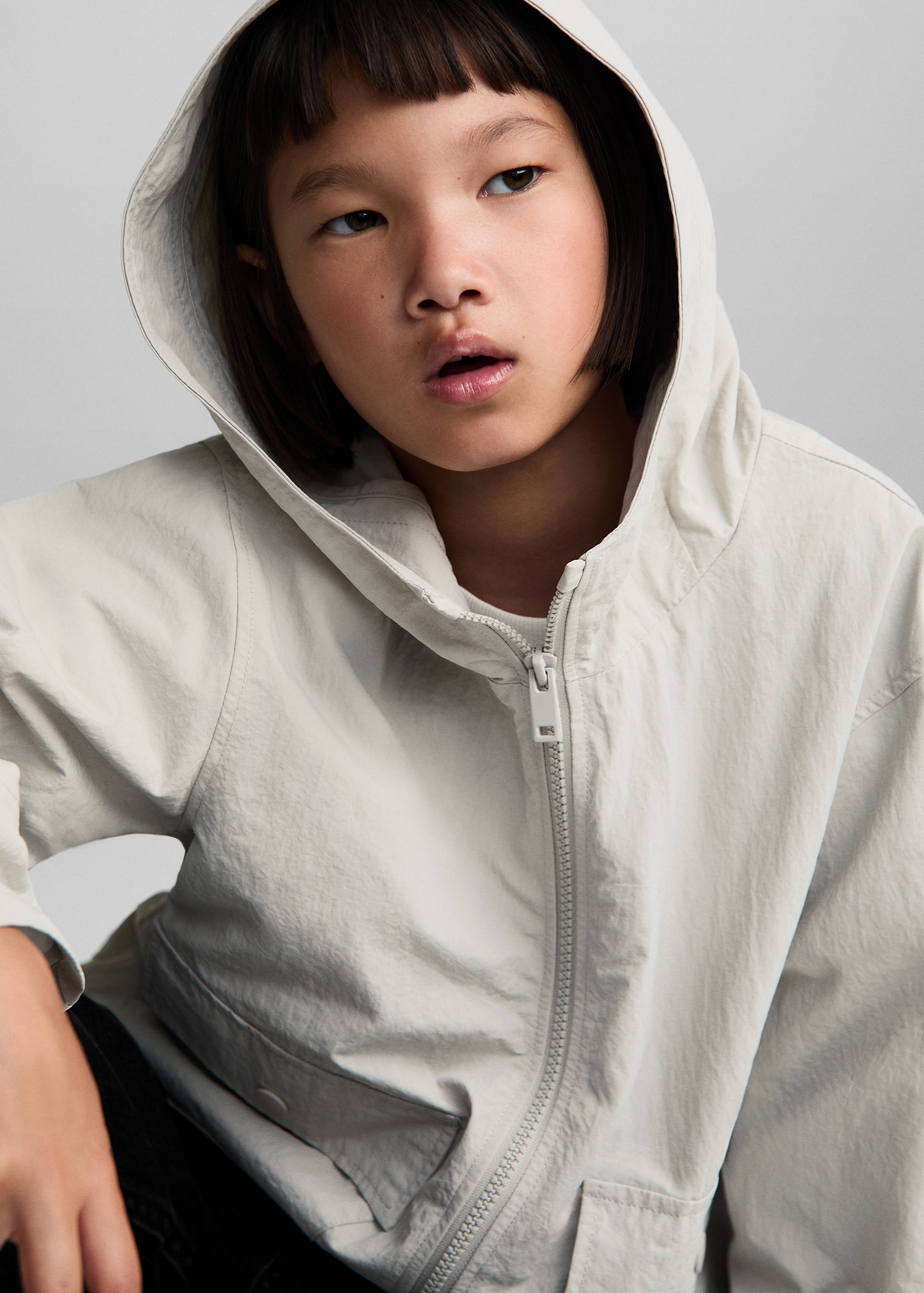 Veste imperméable à capuche - Détail de l'article 1