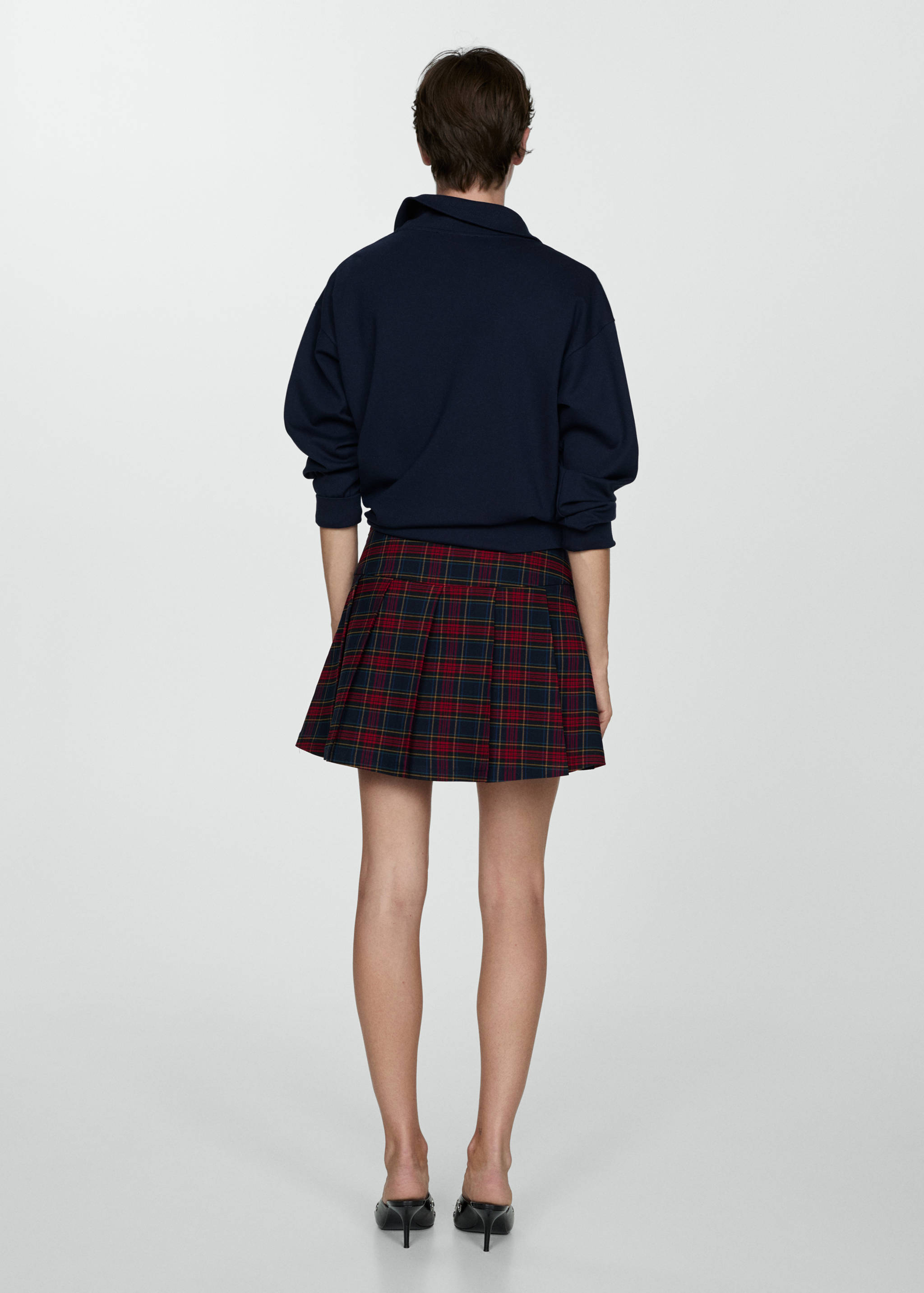 Pleated check skirt - Reverse of the article