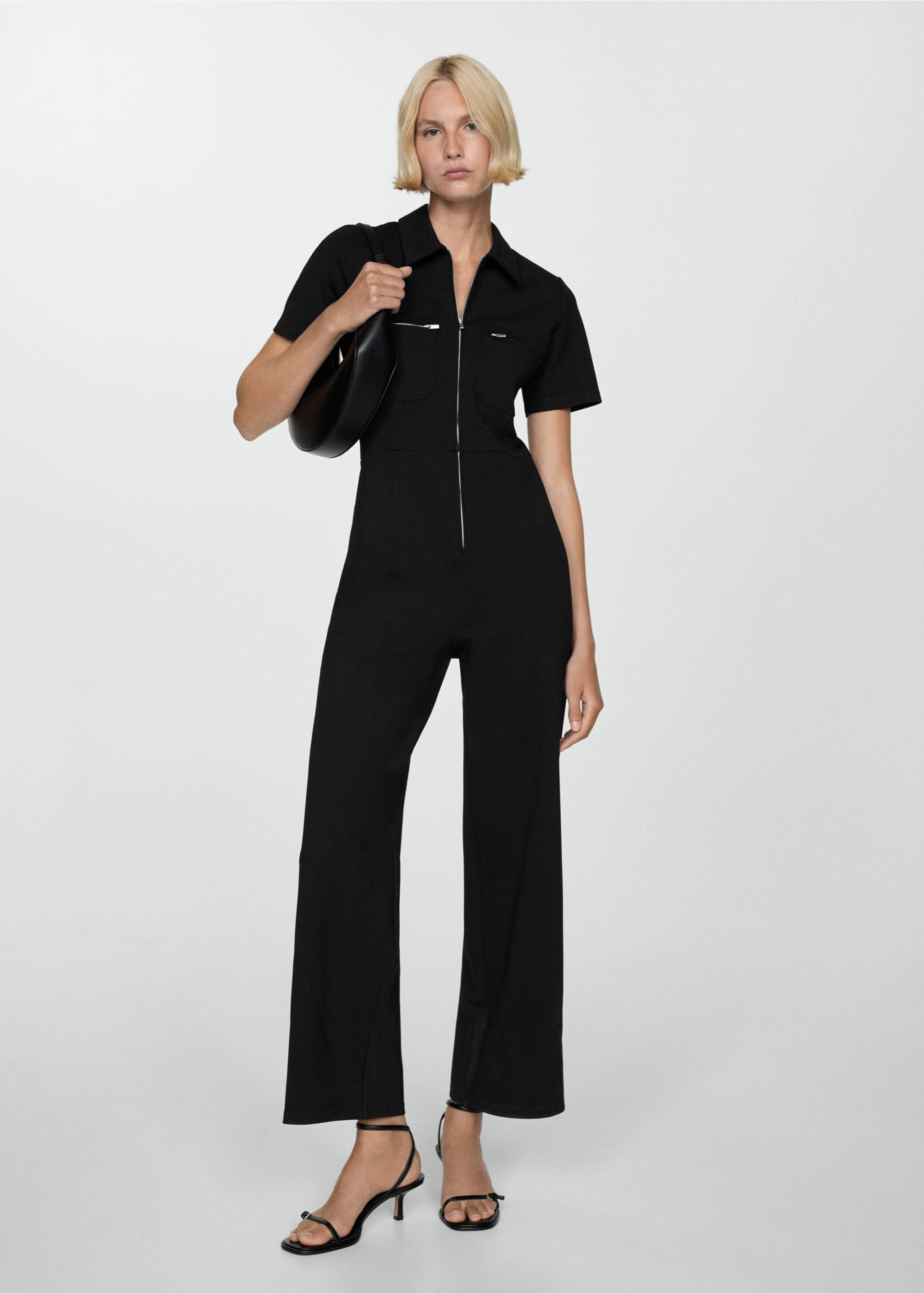 Long chest-pocket jumpsuit - General plane, Black. Ref: 77094036-00.