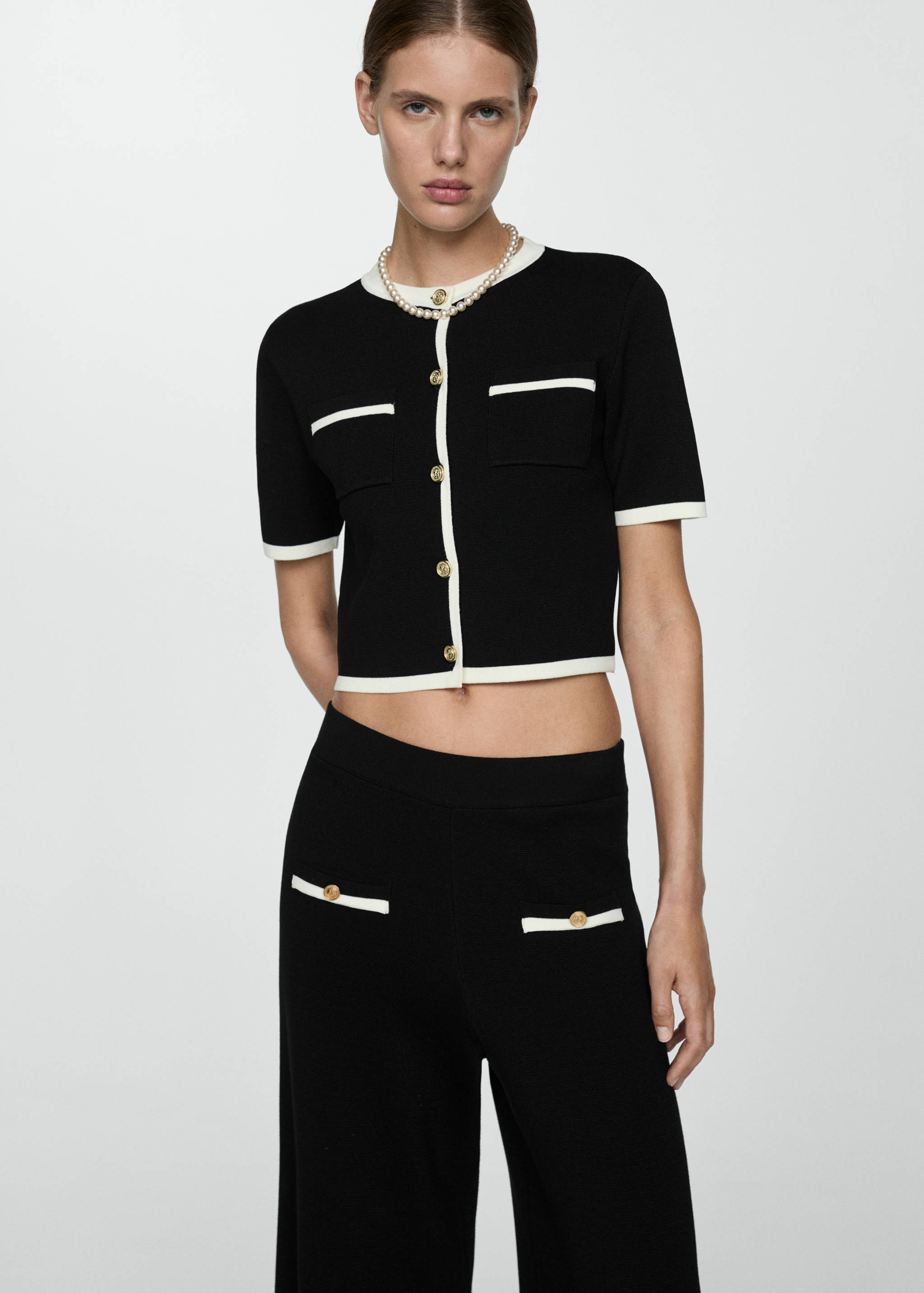 Straight-fit trousers with contrasting piping - Details of the article 1