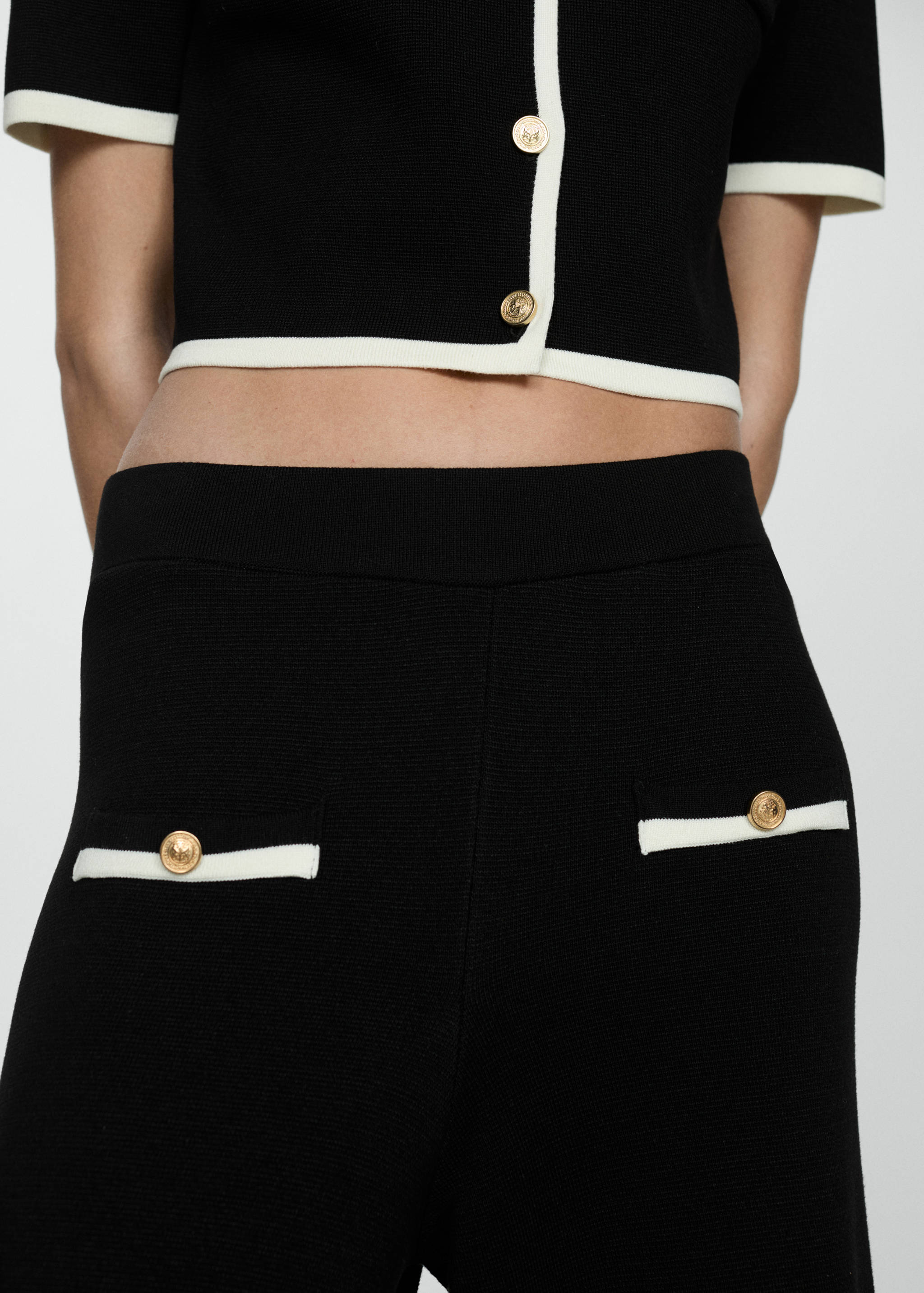 Straight-fit trousers with contrasting piping - Details of the article 6
