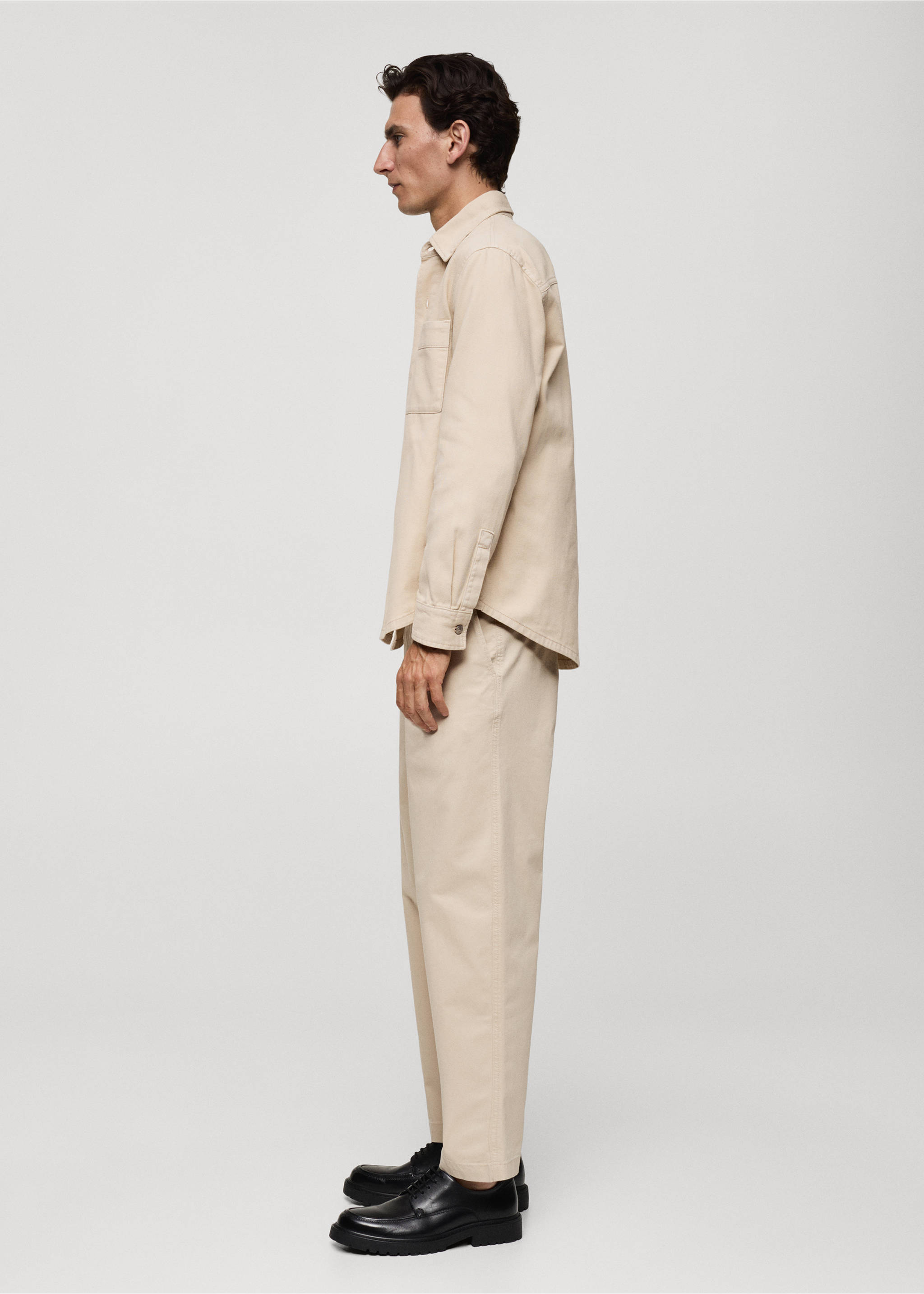 Katoenen regular fit bandplooibroek - Detail van het artikel 2, Zand. Ref: 77094432-00.