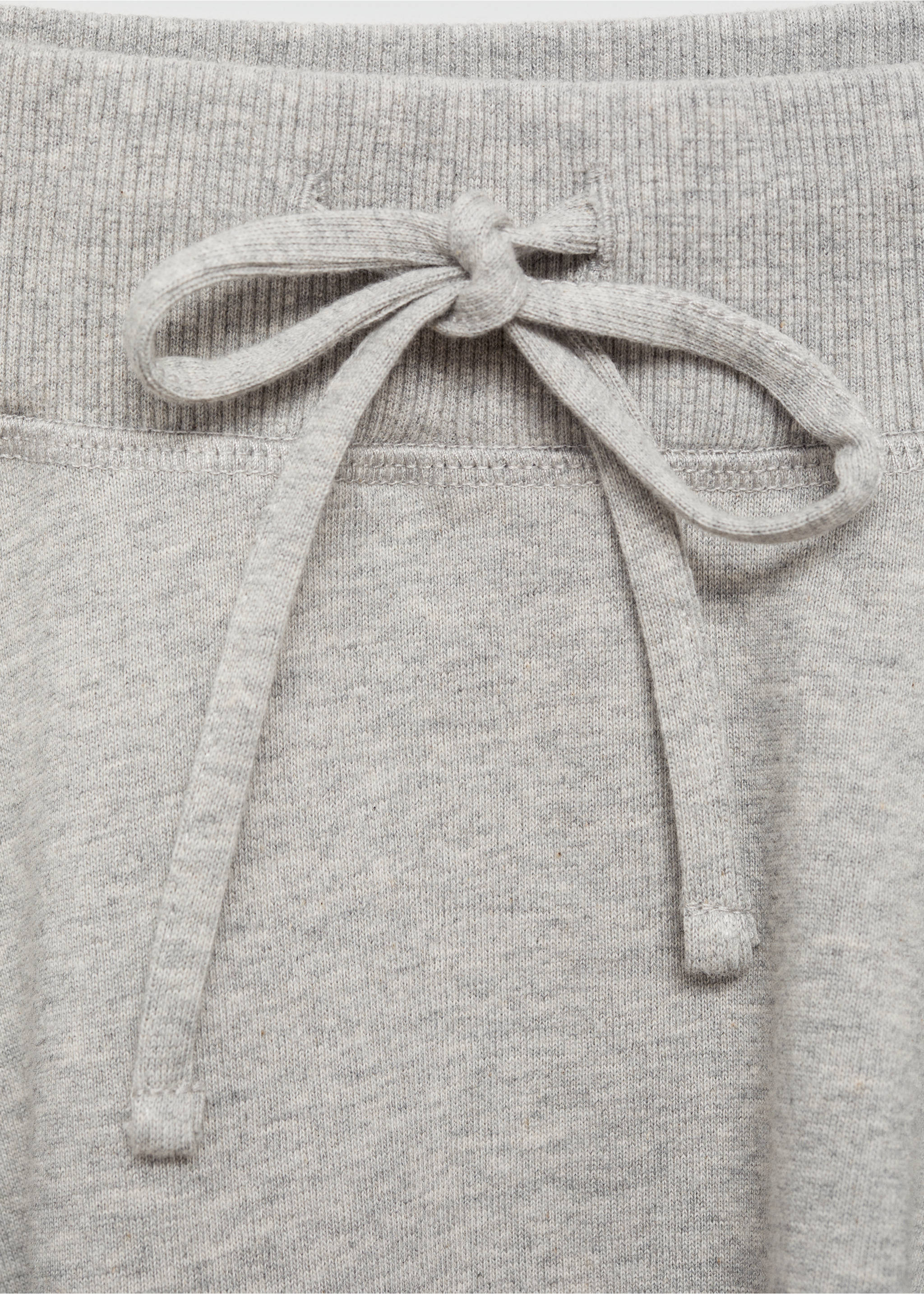 Short skirt with bow - Details of the article 8, Light Heather Grey. Ref: 77096348-00.