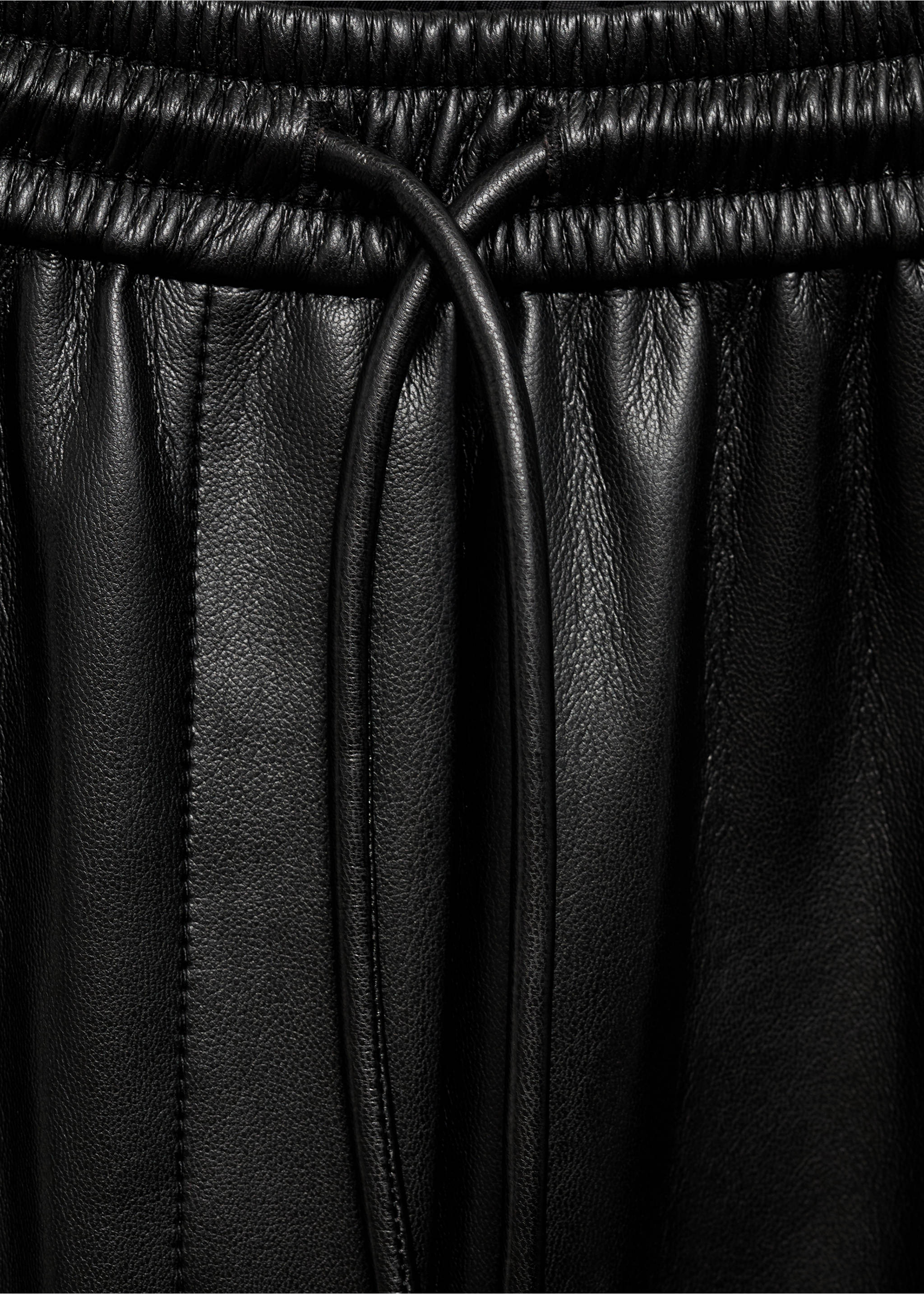 Faux-leather trousers with elastic waist - Details of the article 8, Black. Ref: 77096740-00.