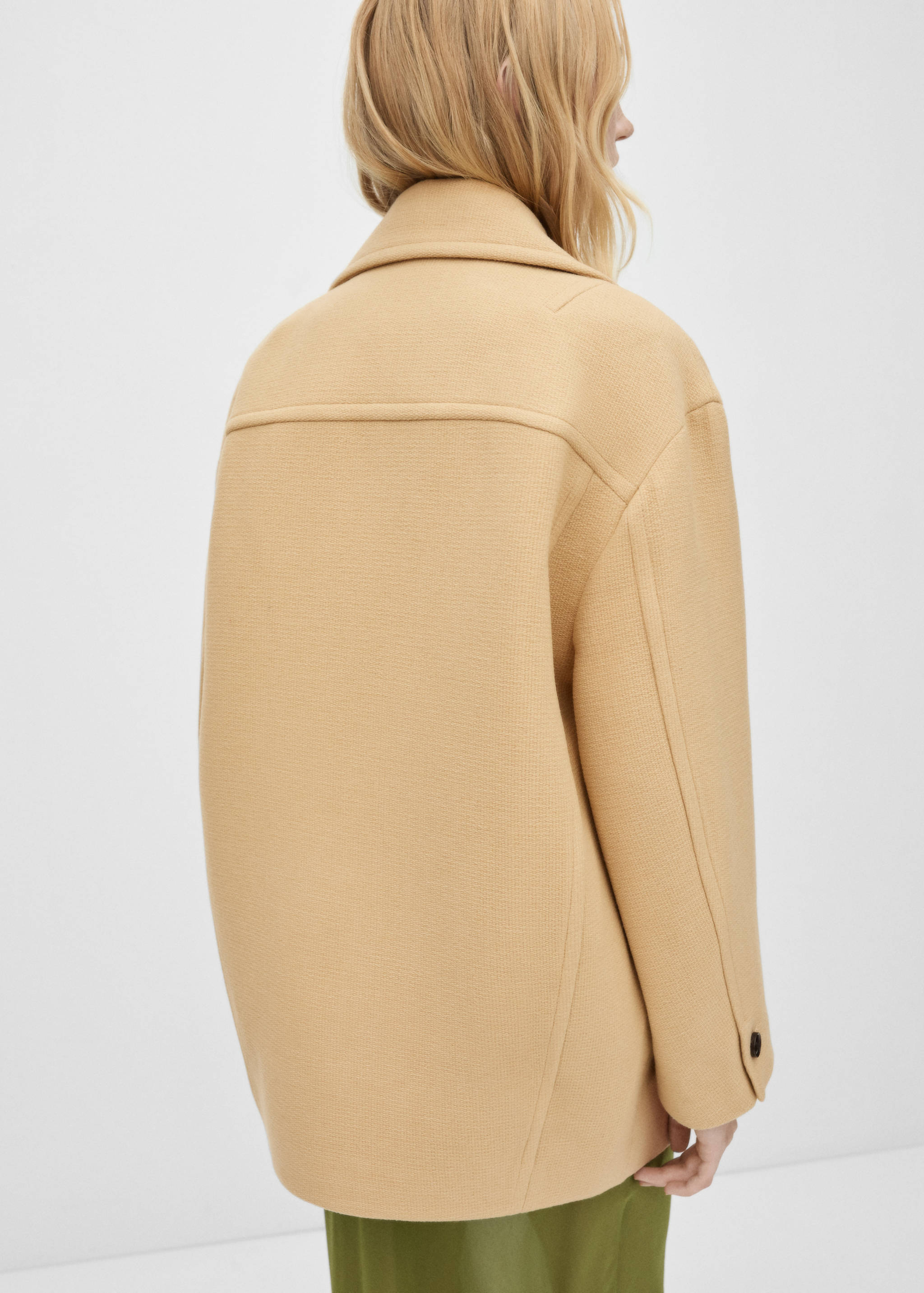 Double-breasted virgin wool coat - Reverse of the article