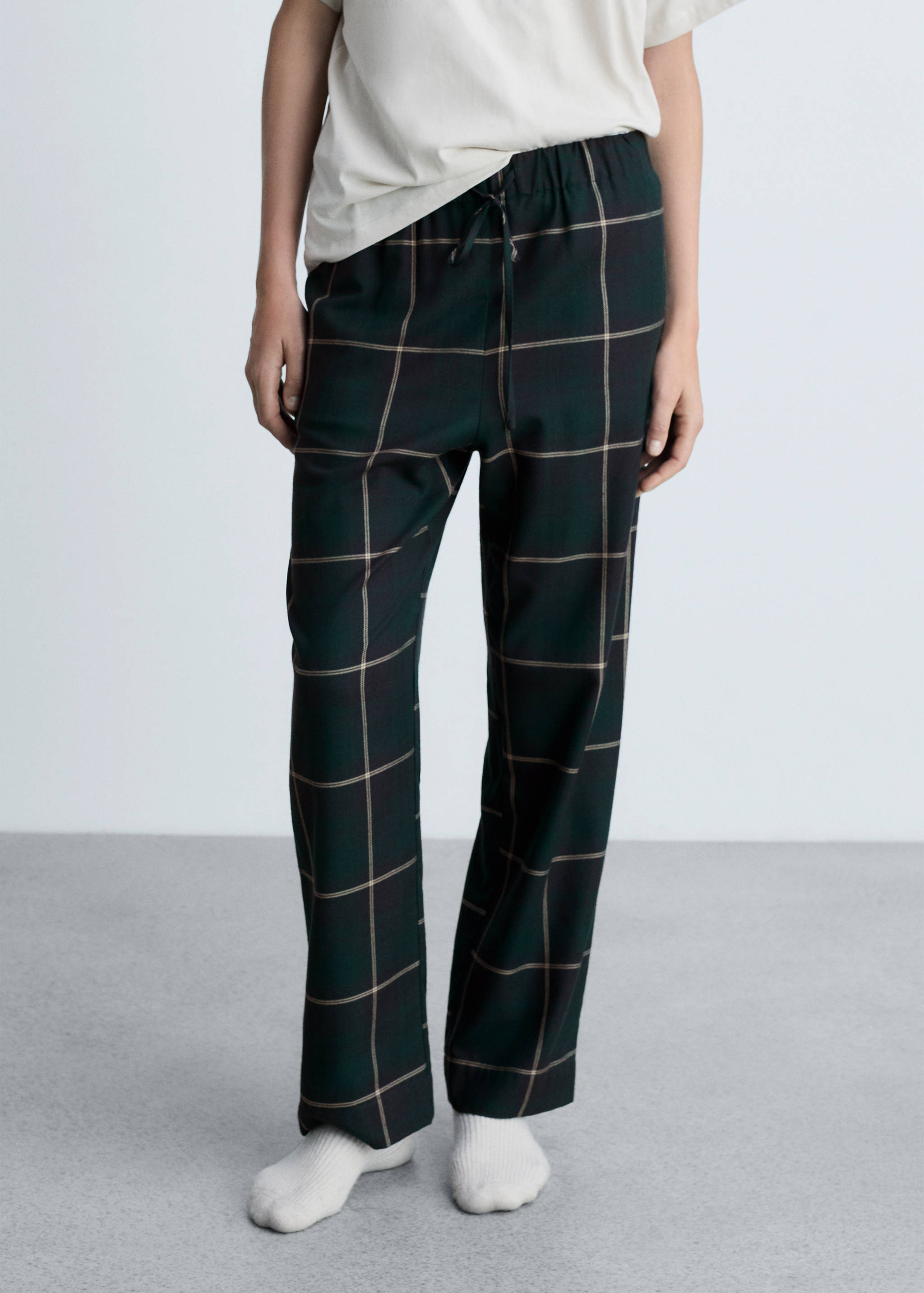 Raka rutiga byxor - Bild av mittparti