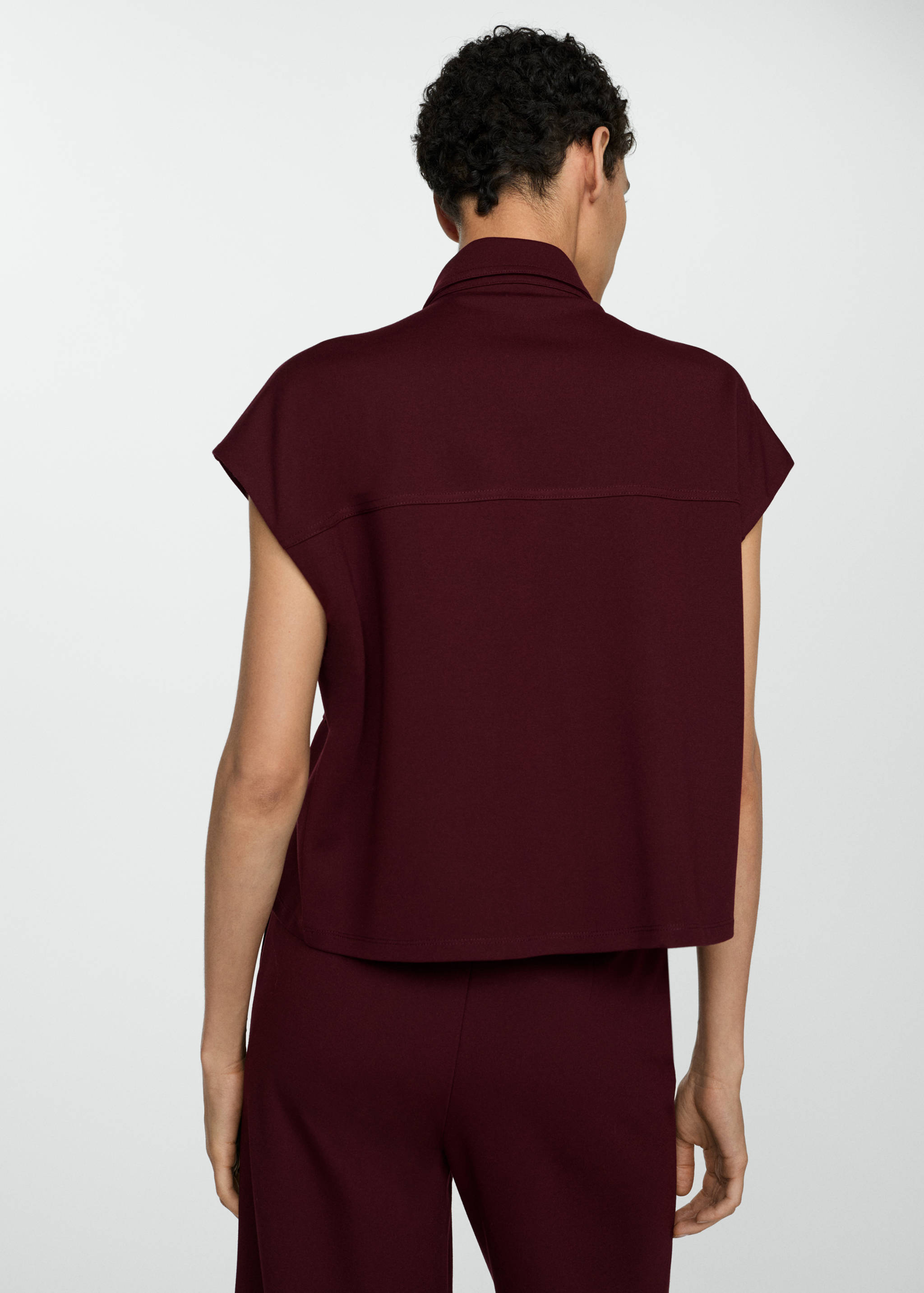 Waistcoat with buttons and pockets - Reverse of the article