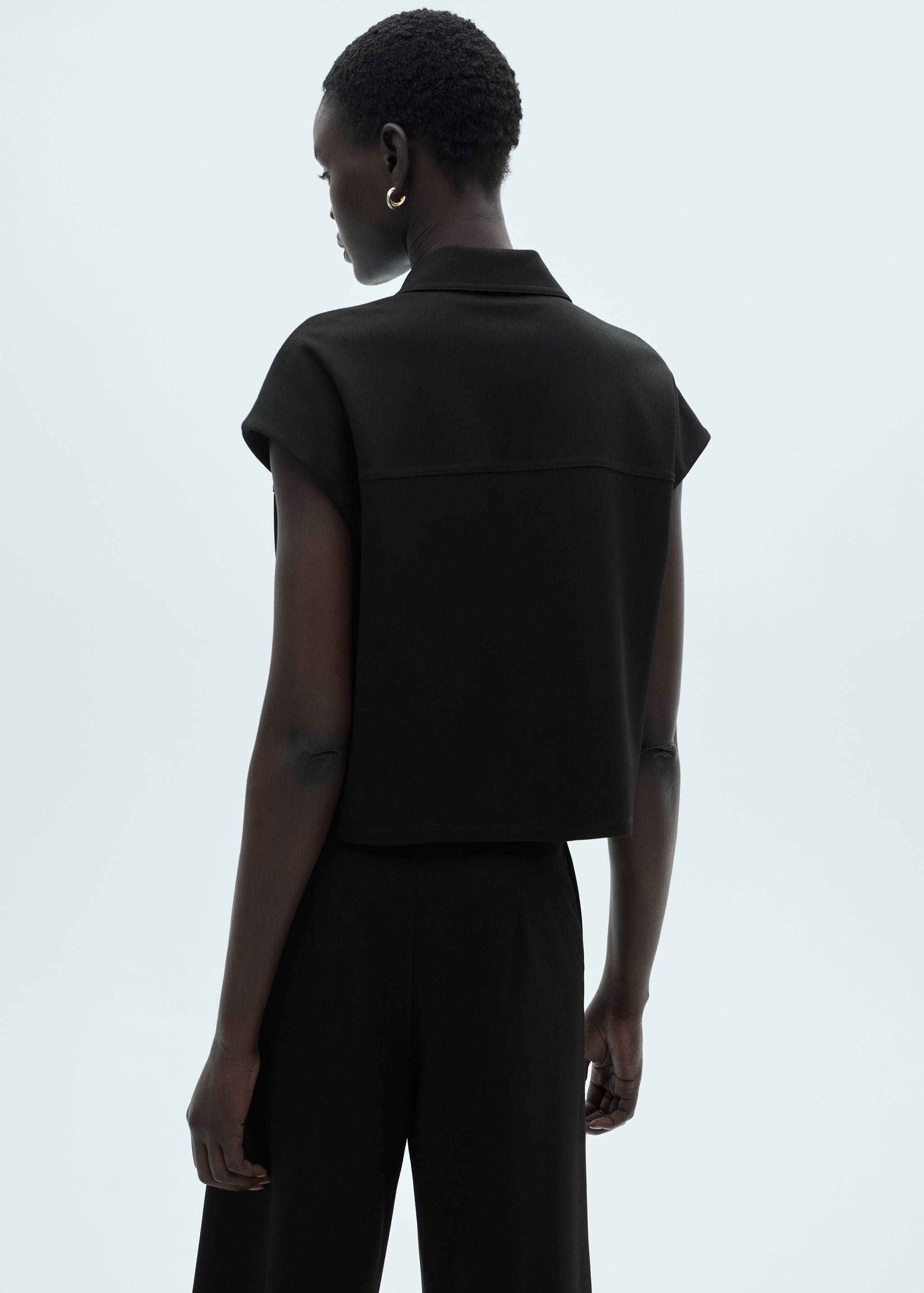 Waistcoat with buttons and pockets - Reverse of the article