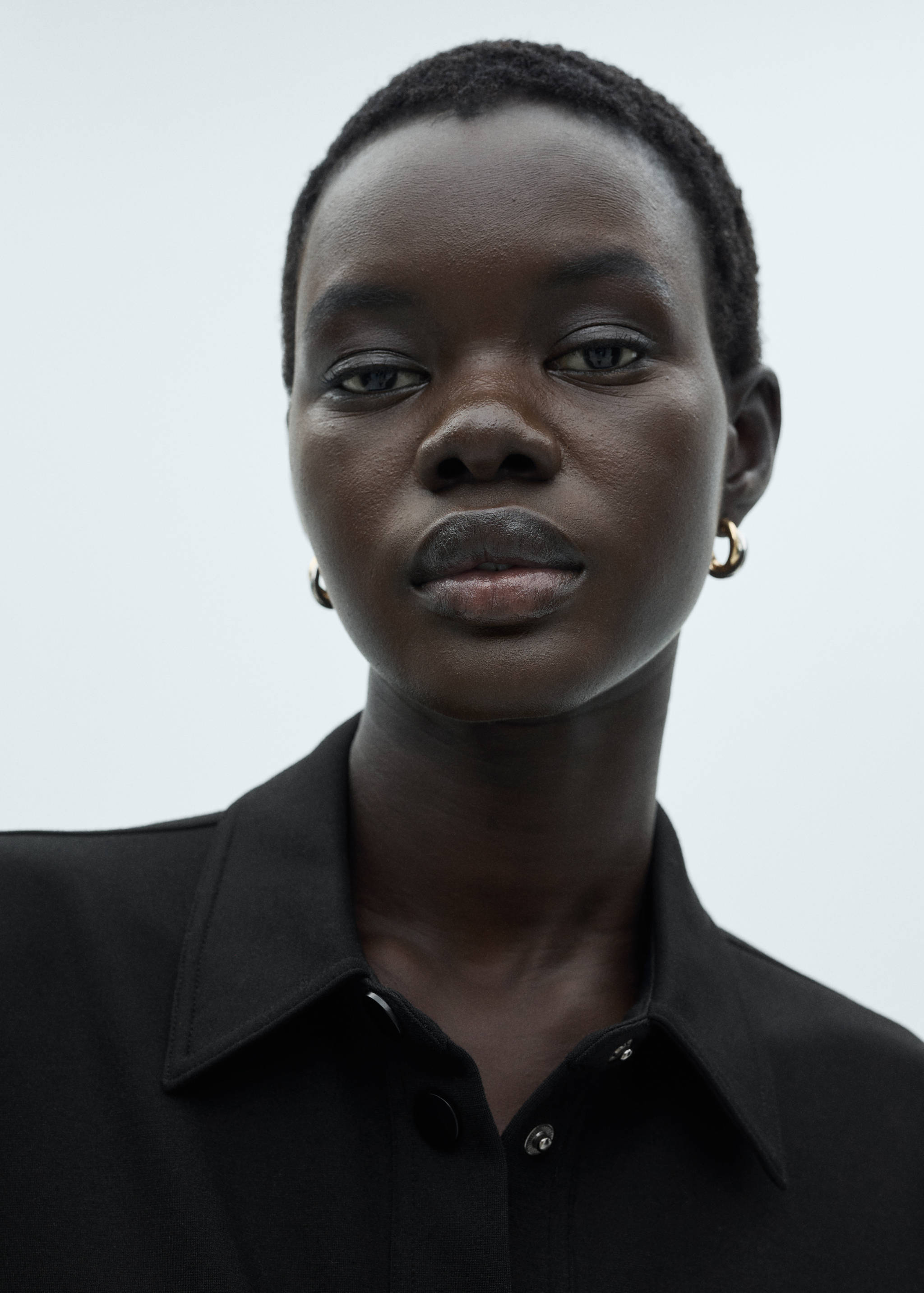 Waistcoat with buttons and pockets - Details of the article 1