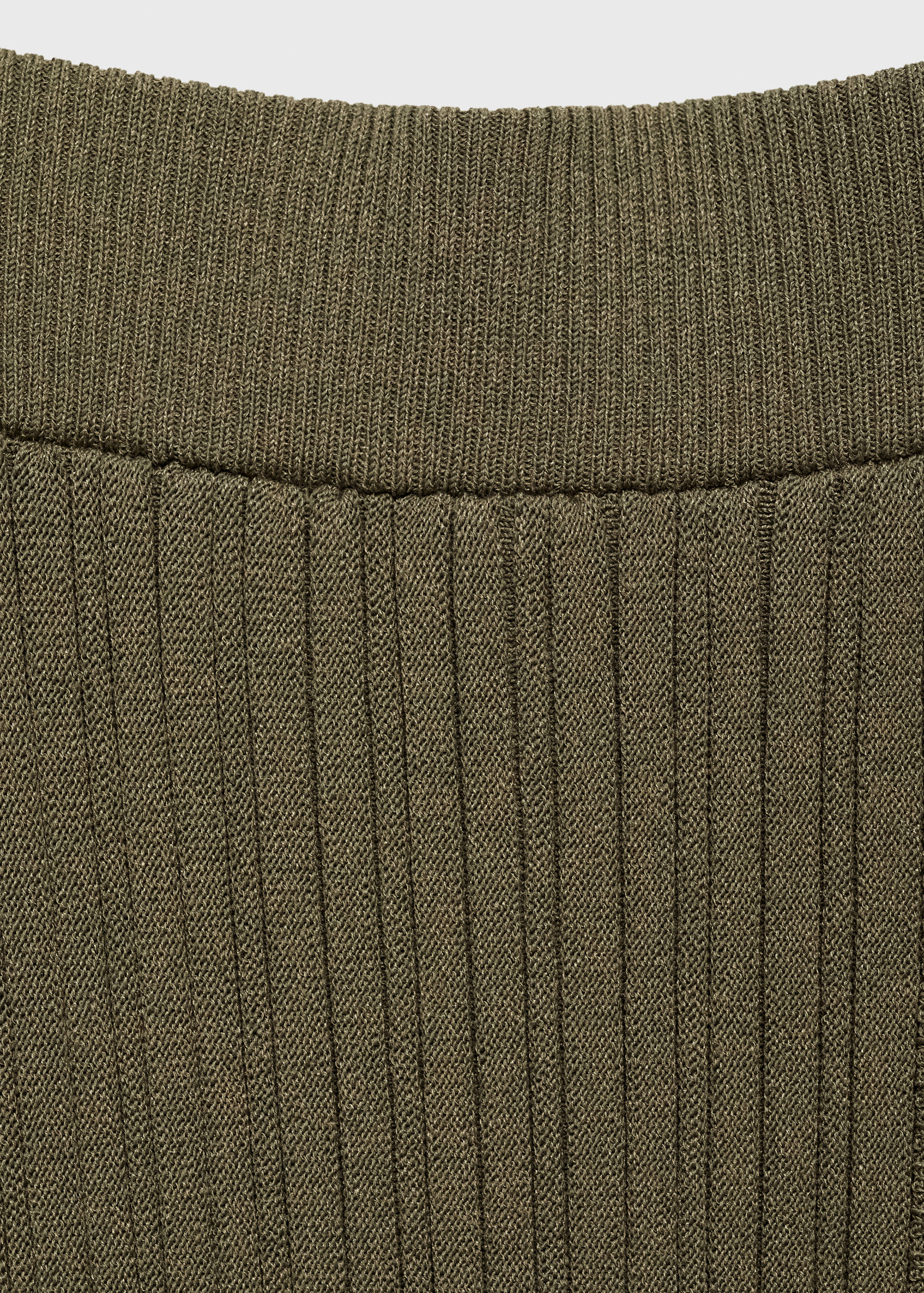 Gebreide rok met knopen - Detail van het artikel 8