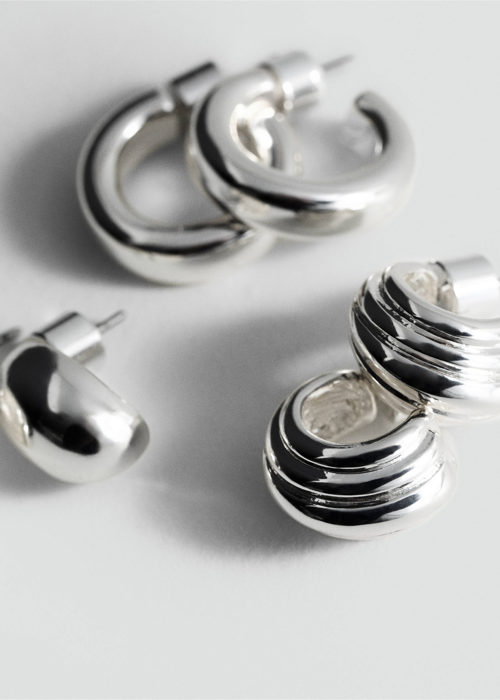 Set boucles d’oreilles combinées - Plan moyen, Argent. Ref: 87000453-00.