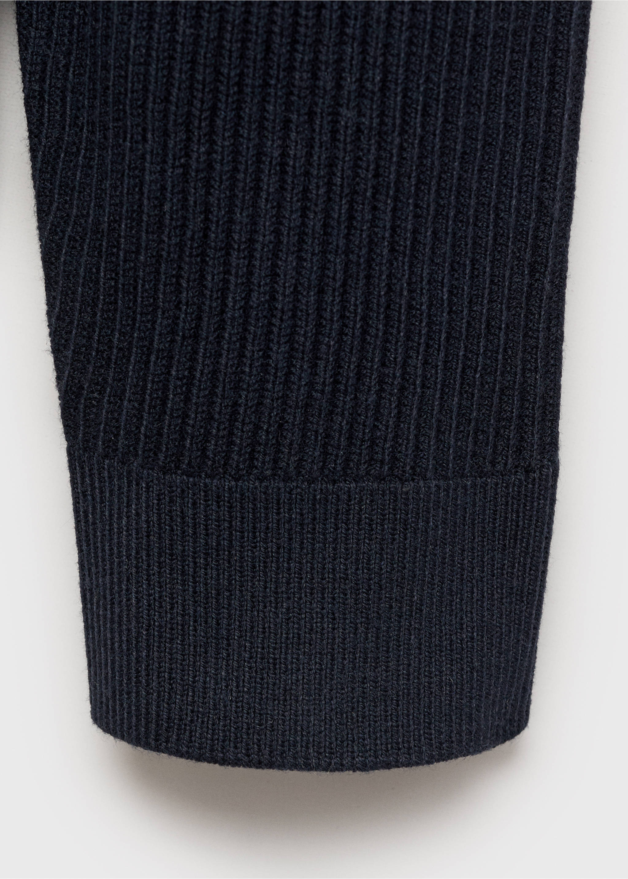 Close-up of a dark navy blue ribbed knit jersey cuff., Dark Navy. Ref: 87000611-00.