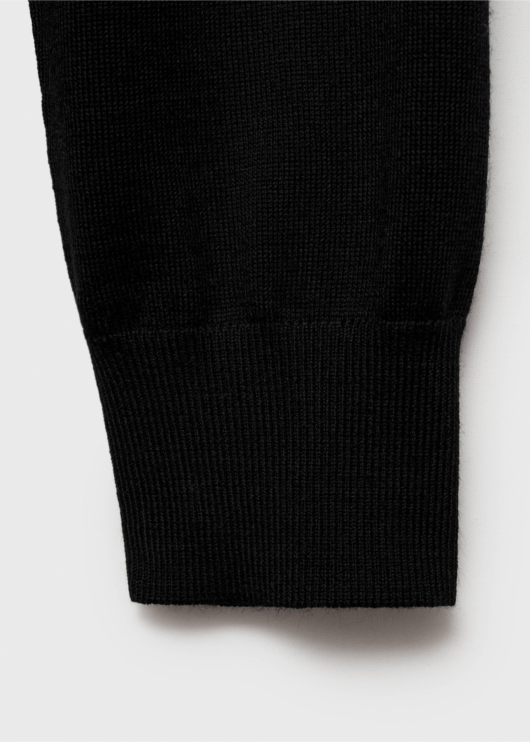 Rollkragenpullover aus 100 % Merinowolle - Detail des Artikels 8, Schwarz. Ref: 87000619-00.
