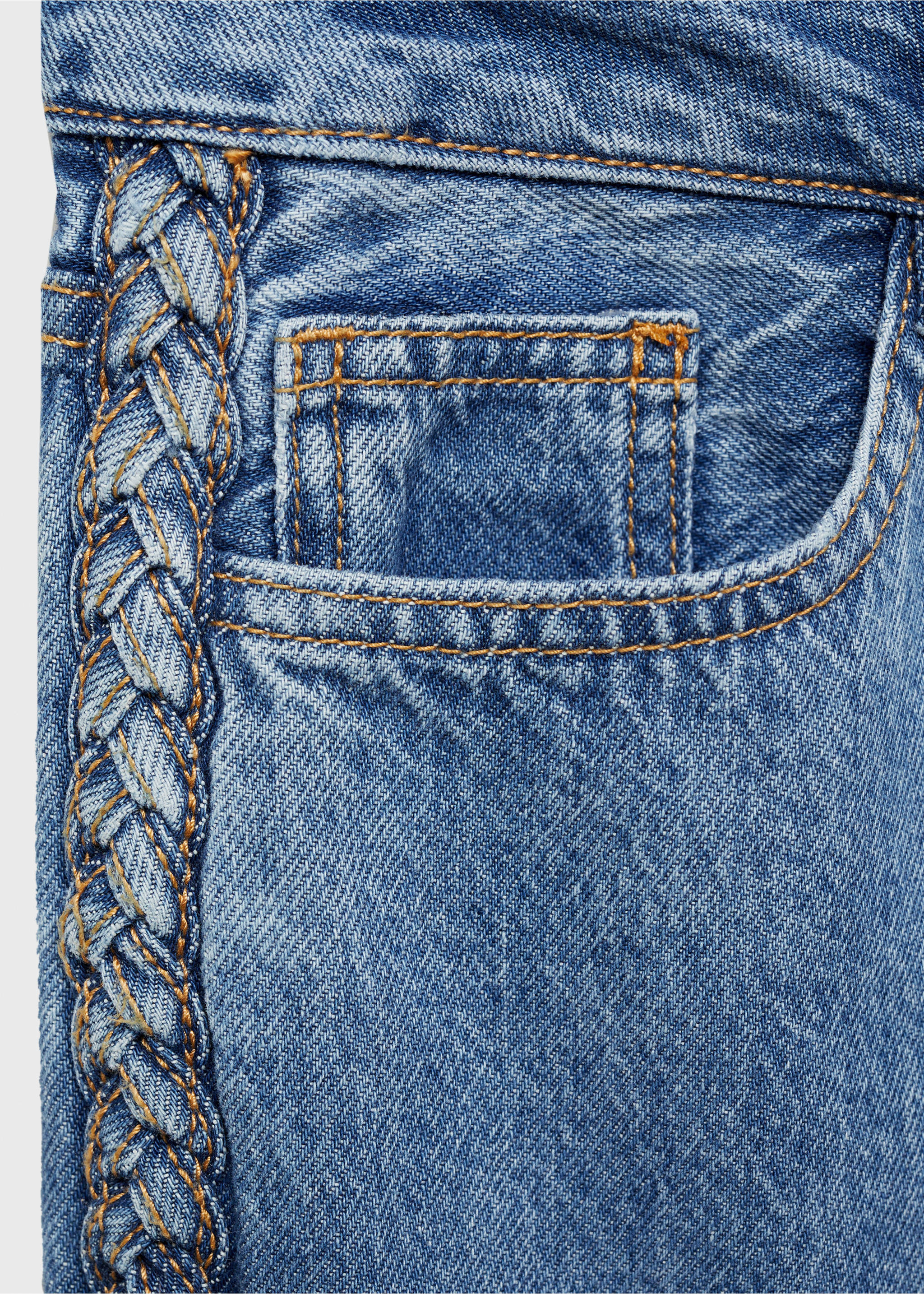 Jeans met gevlochten zijkant - Detail van het artikel 0, Middenblauw. Ref: 87001092-00.