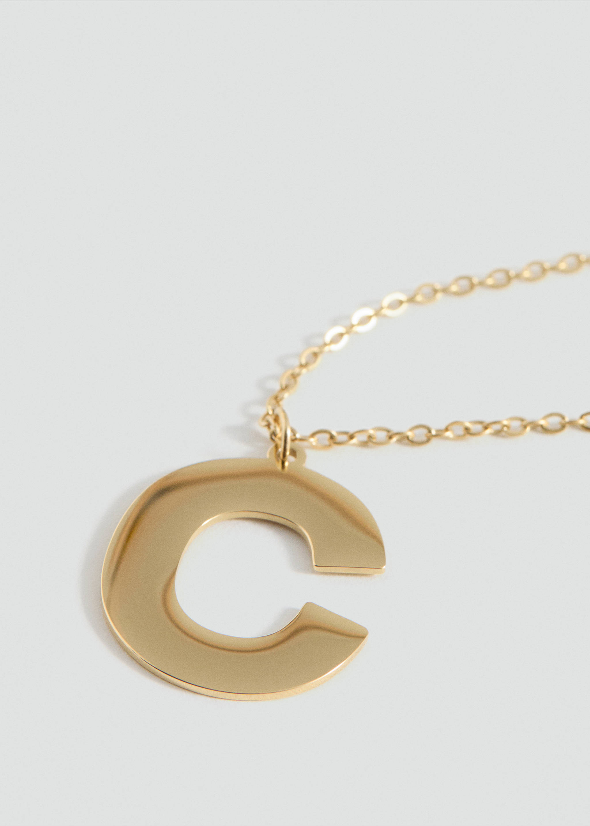 Letter Pendant Necklace - Medium plane, Gold. Ref: 87003311-00.