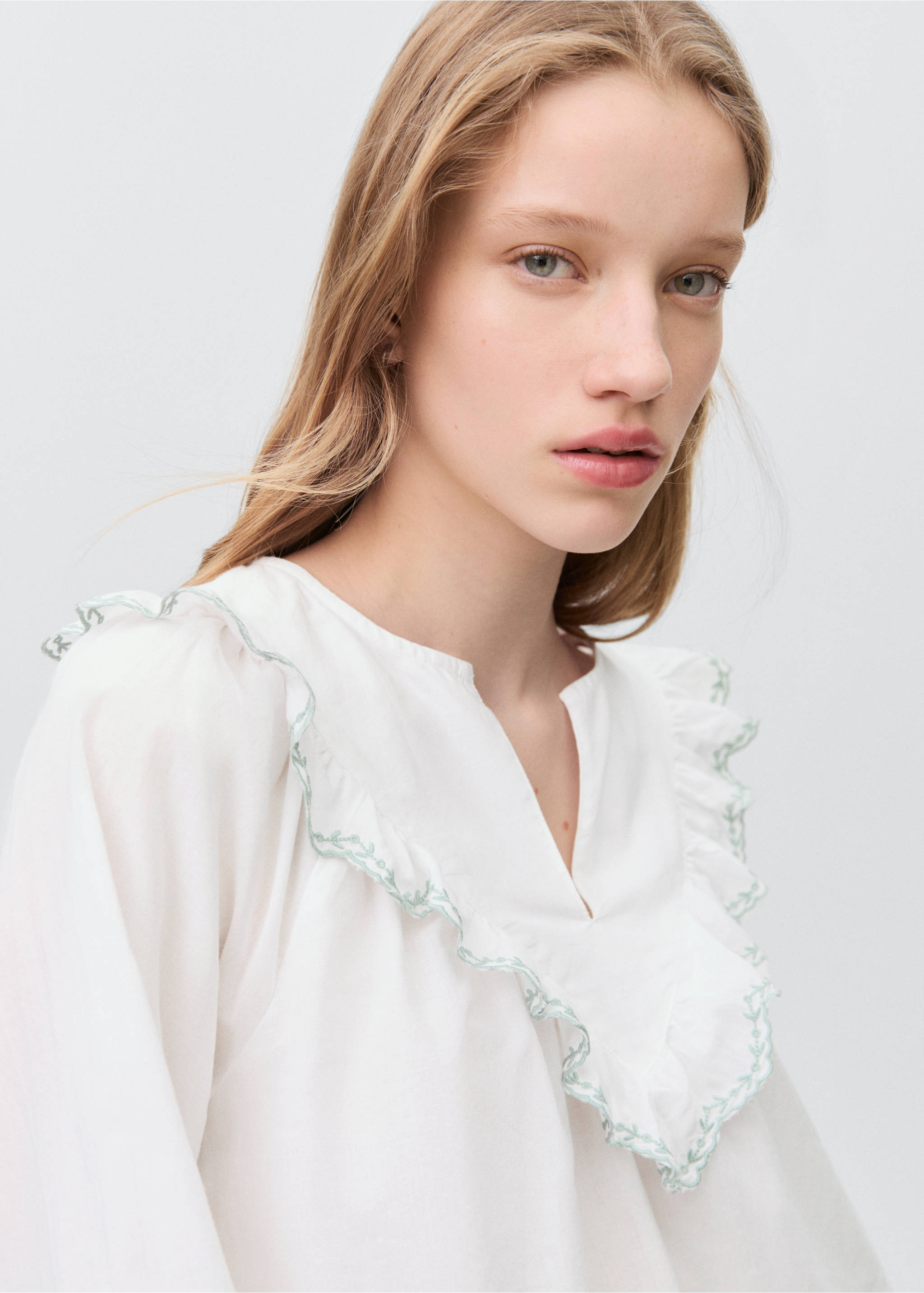Ruffle neck blouse - Details of the article 1, Off White. Ref: 87004792-00.