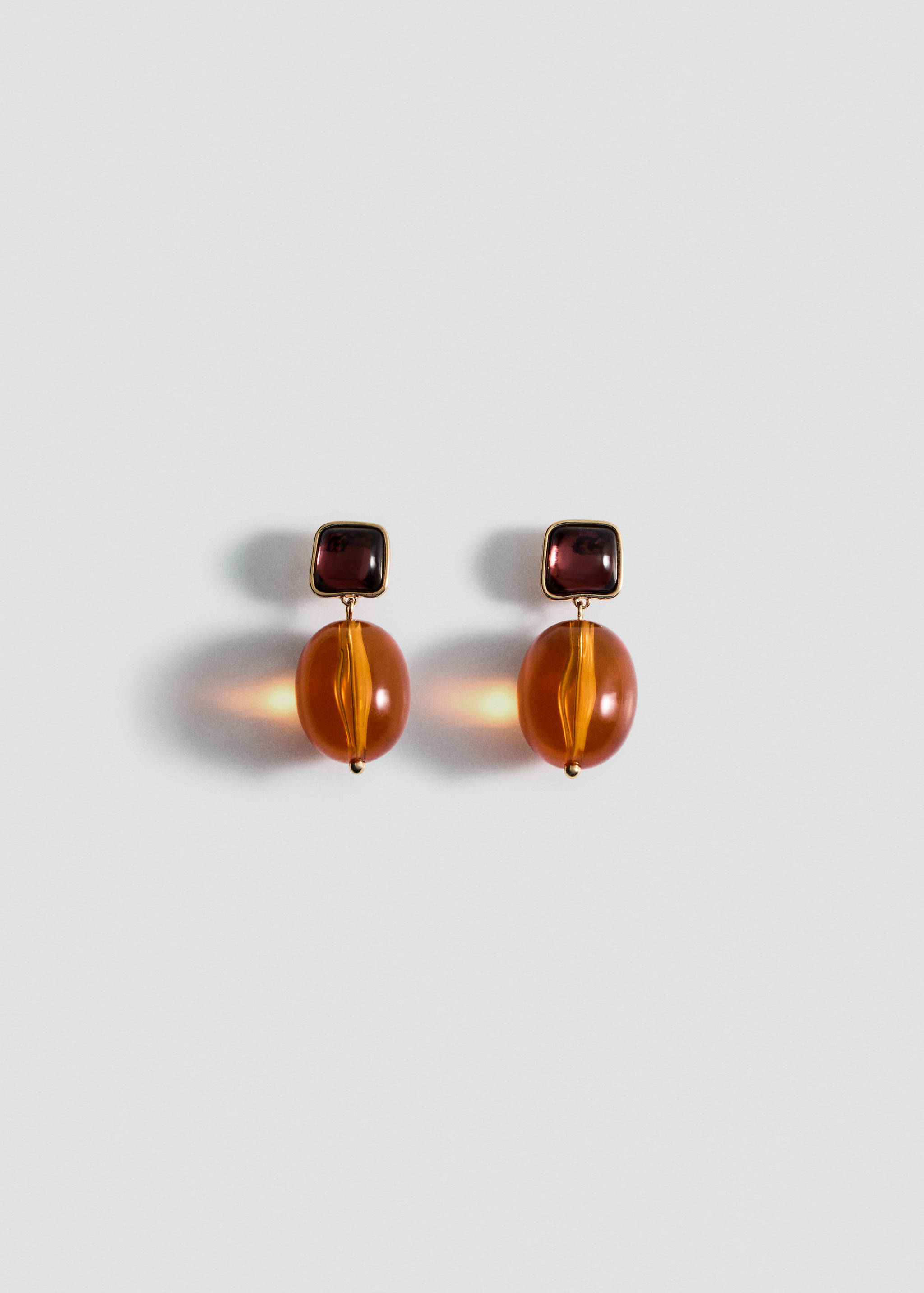 Resin hanging bead earrings - Article without model