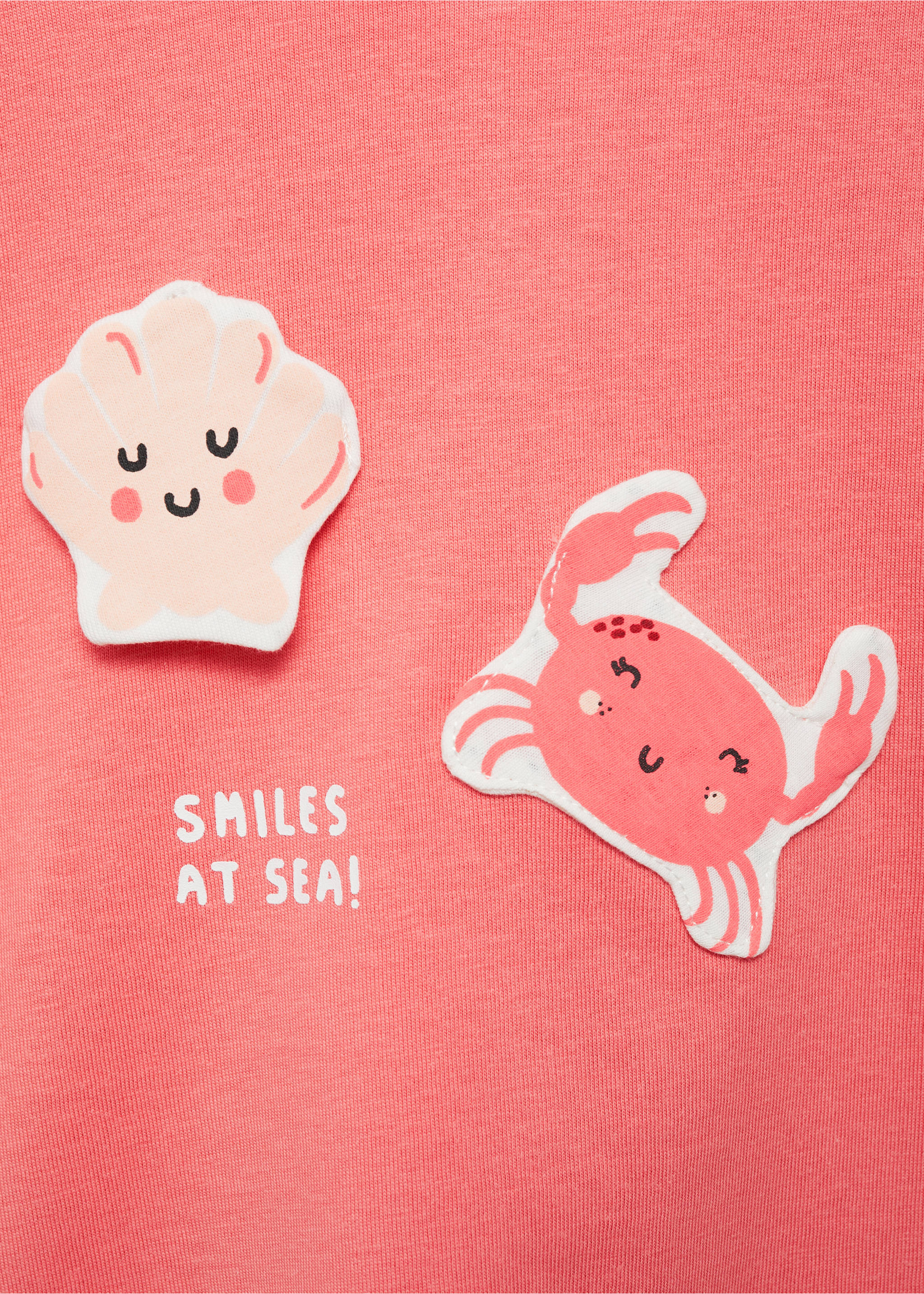 T-Shirt Baumwolle mit Reliefmuster - Detail des Artikels 0, Korallrot. Ref: 87006359-00.