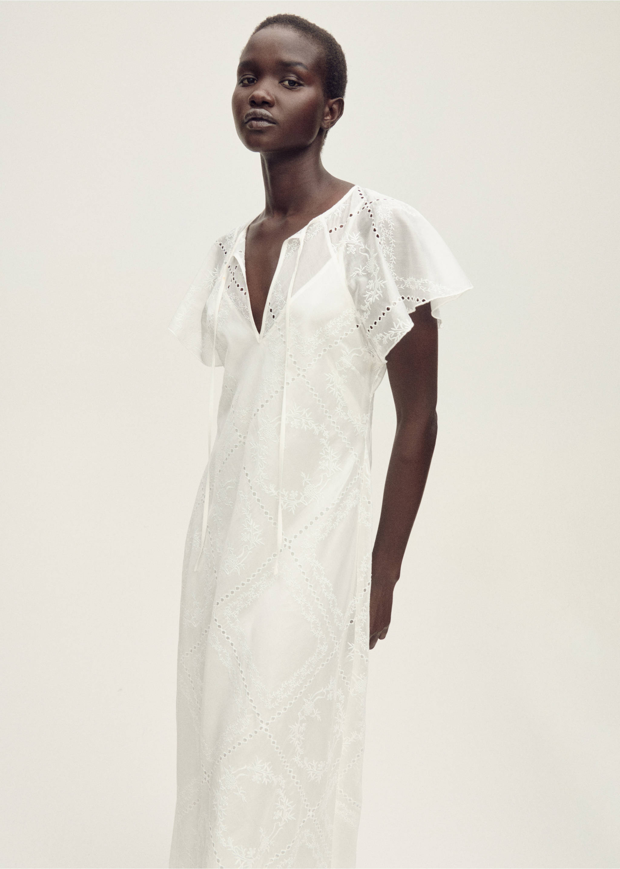 Embroidered dress with openwork details - Details of the article 2, White. Ref: 87007189-00.