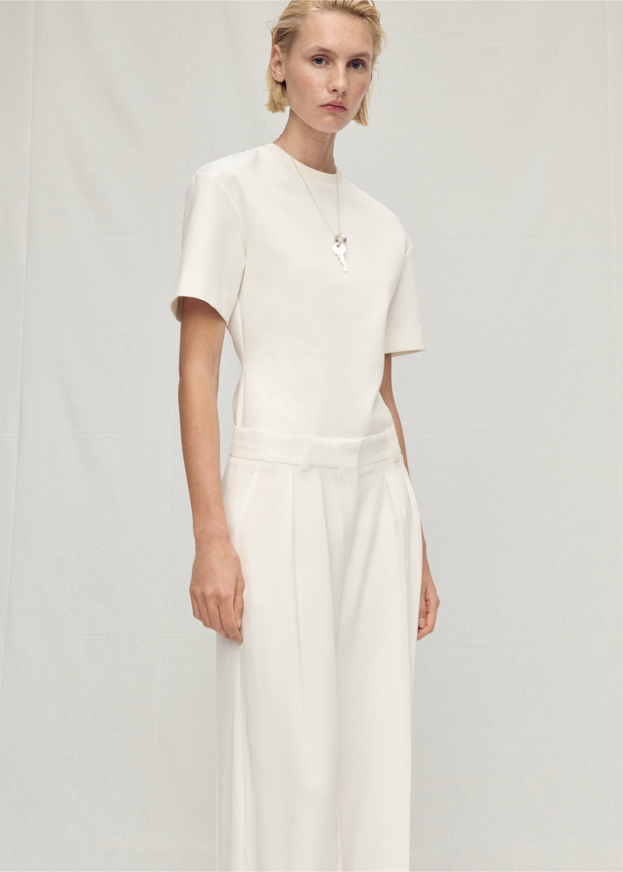 Pantalon costume lyocell à pinces - Détail de l'article 1, Blanc cassé. Ref: 87007720-00.