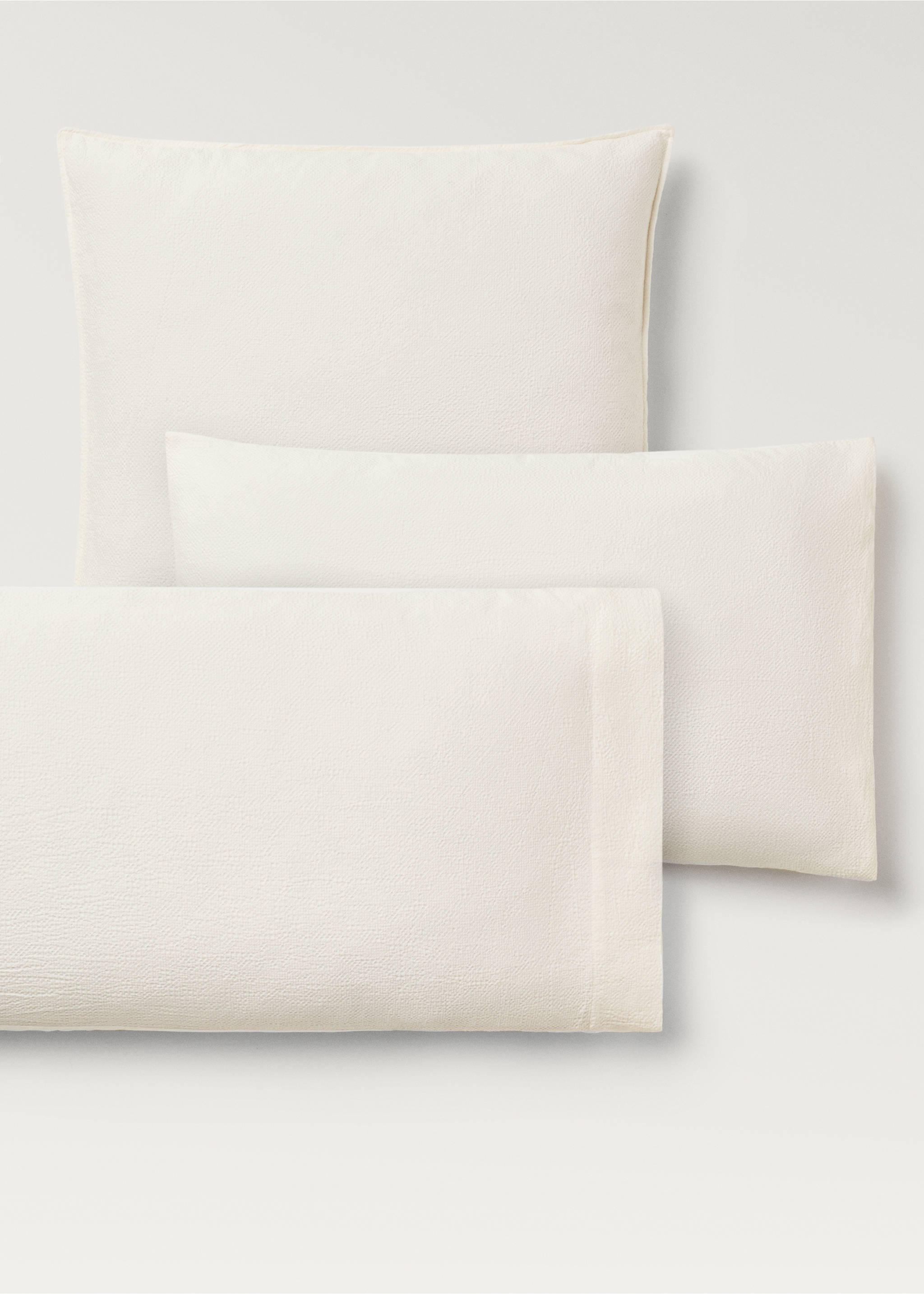 Two textured cotton percale pillowcases 60x60 cm - Details of the article 4, Ecru. Ref: 87013034-00.