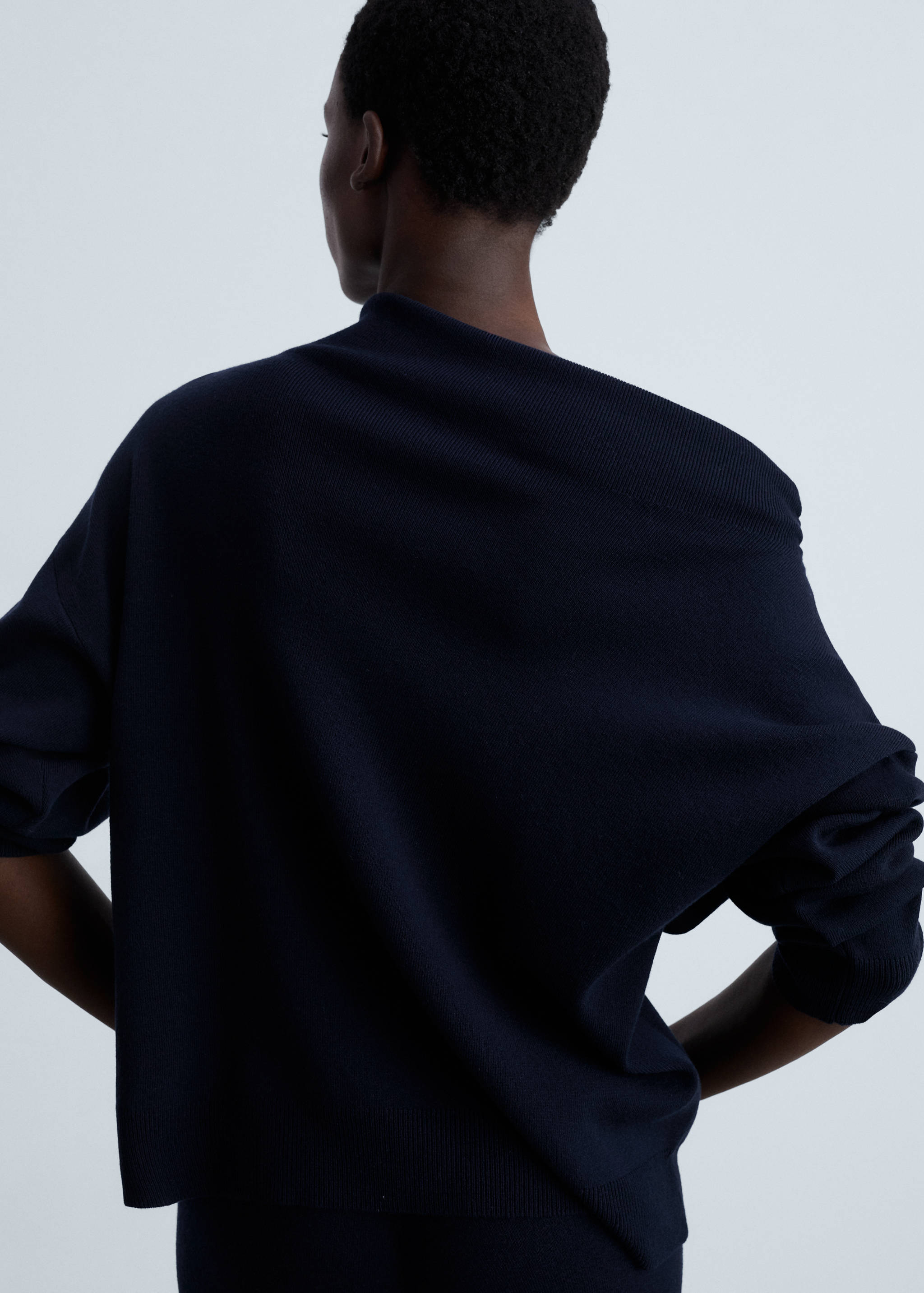 Knitted sweater with asymmetrical neck - Reverse of the article