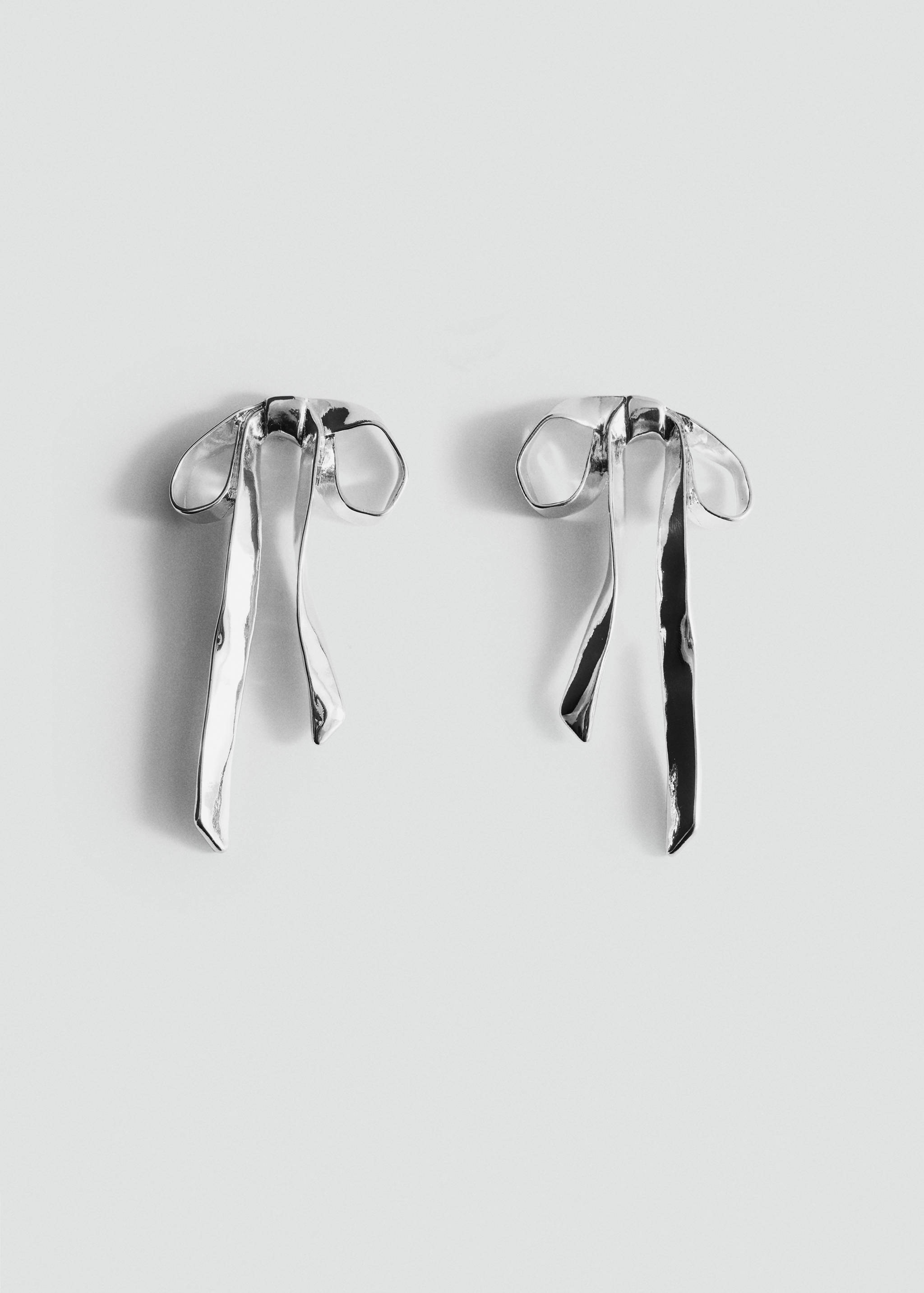 Rigid bow earrings - Article without model
