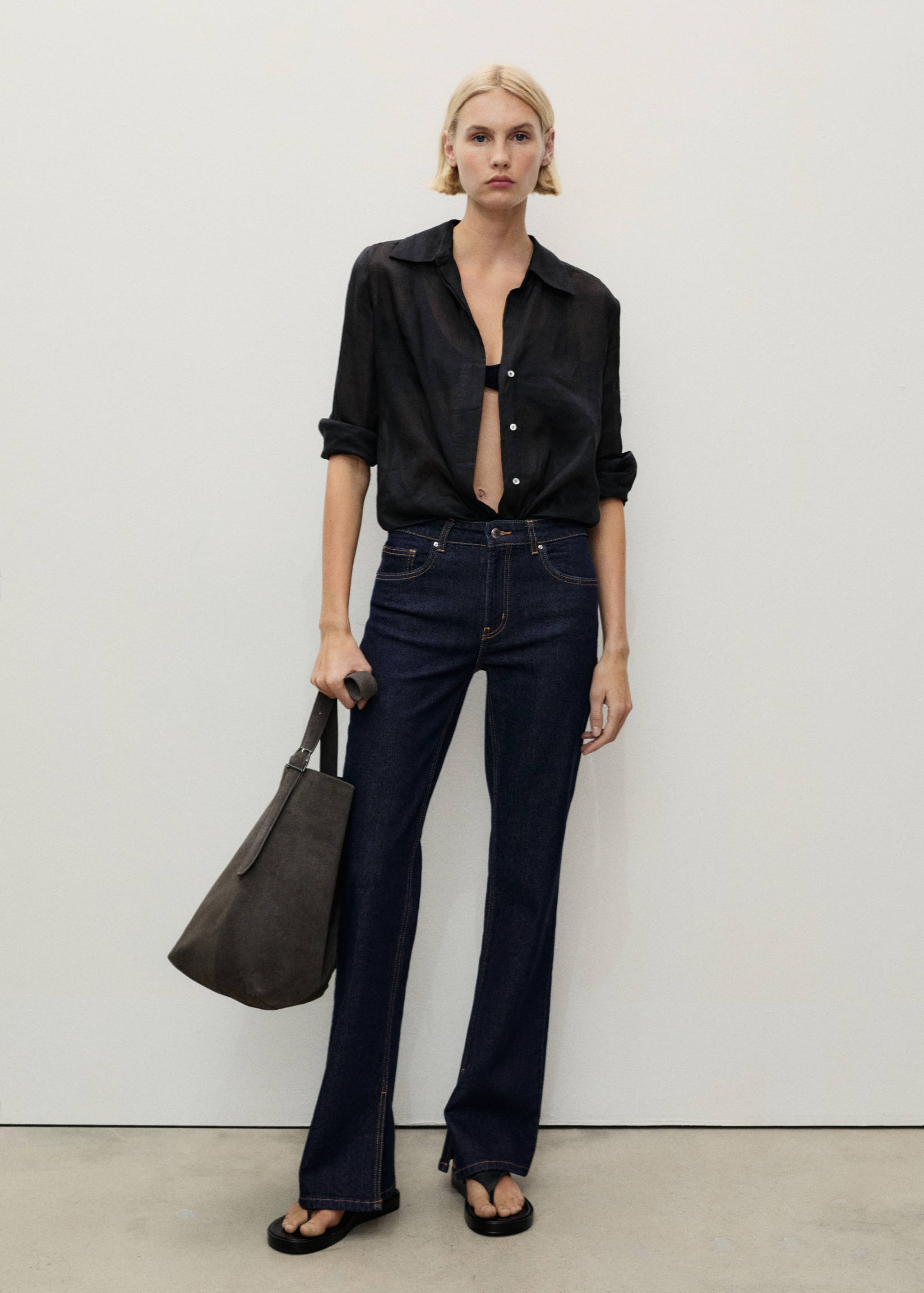 Rinse-wash flared jeans with openings - General plane