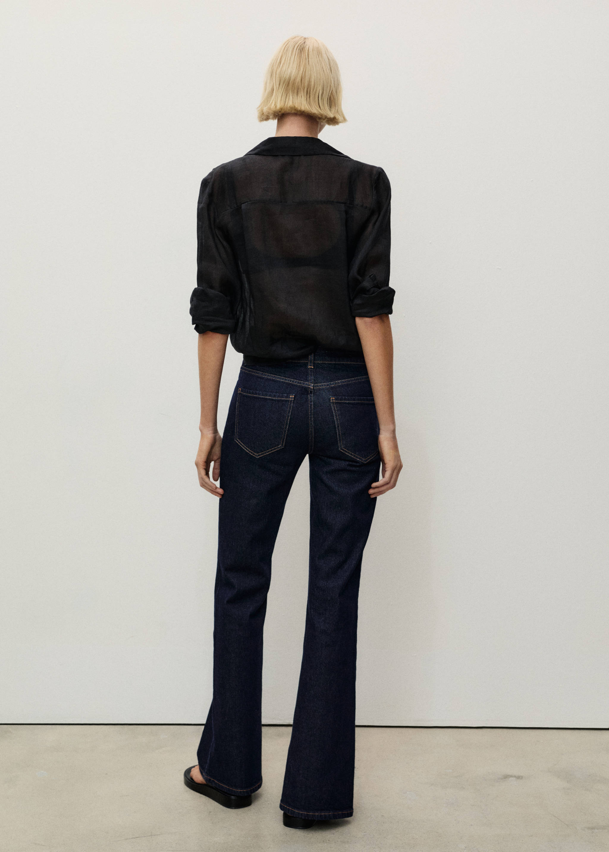 Rinse-wash flared jeans with openings - Reverse of the article