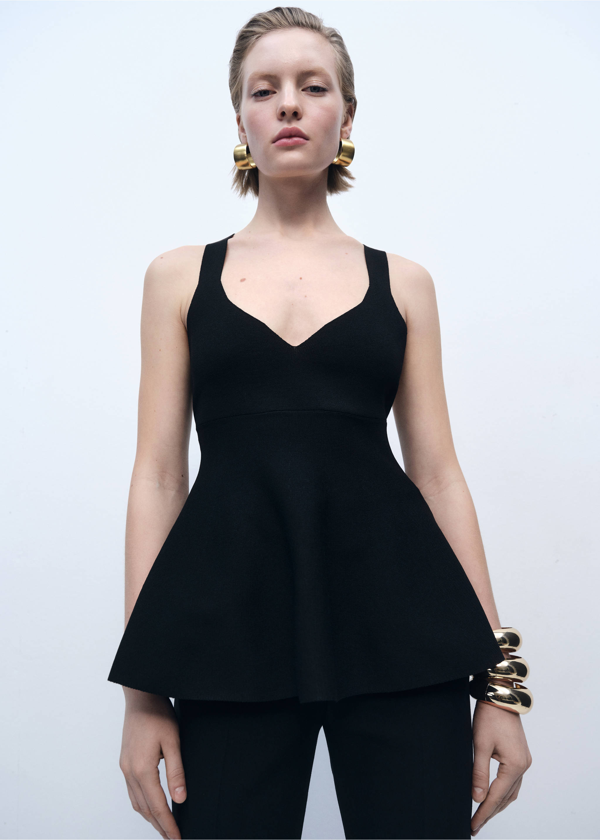 Fine-knit peplum top - Medium plane, Black. Ref: 87015765-00.