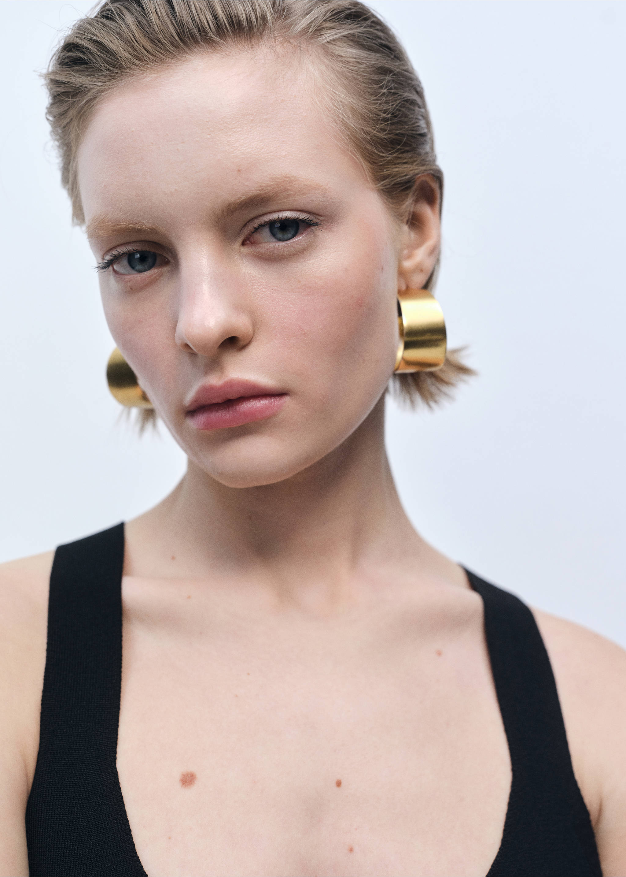 Fine-knit peplum top - Details of the article 2, Black. Ref: 87015765-00.