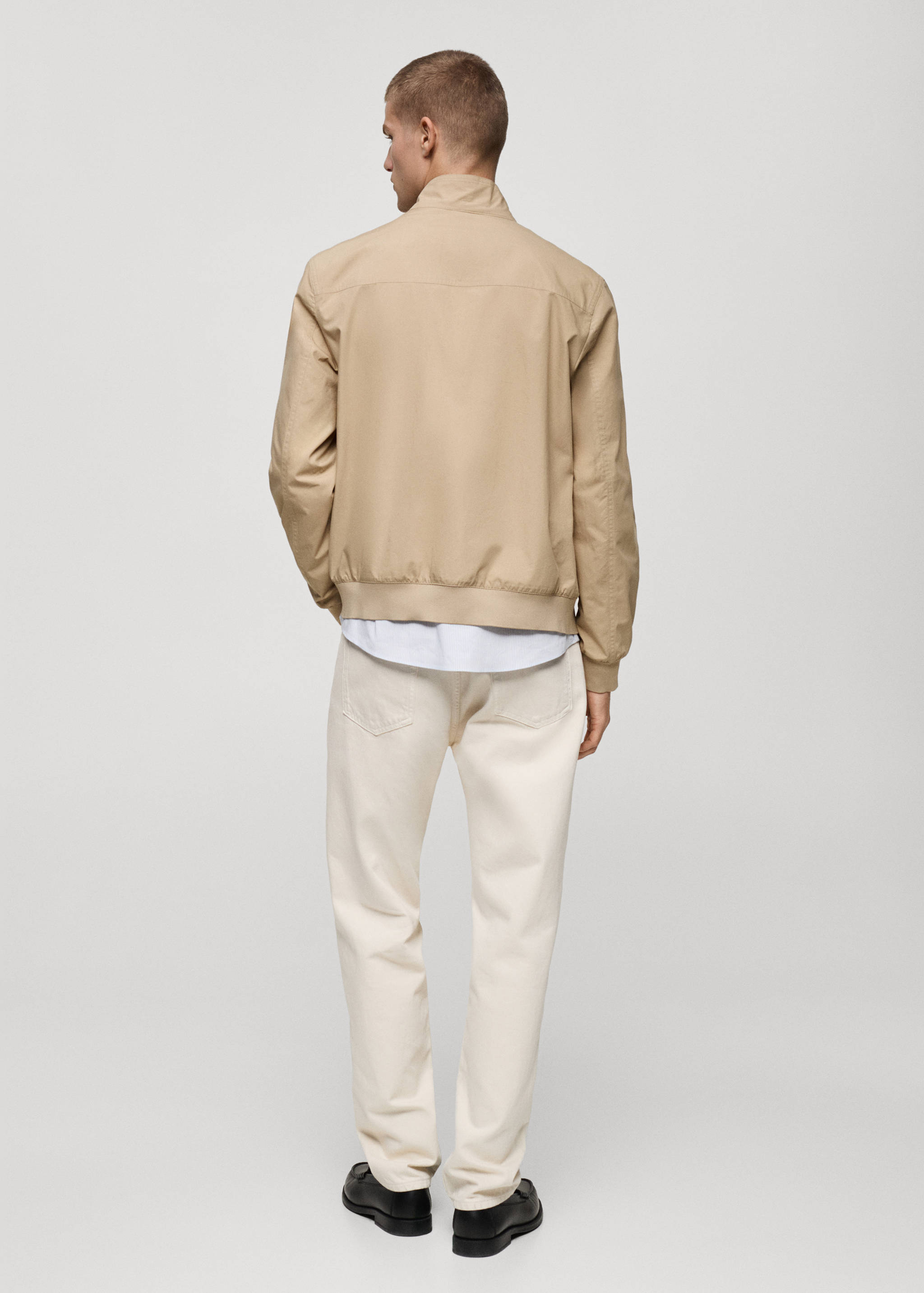 Lightweight jacket with funnel neck - Reverse of the article