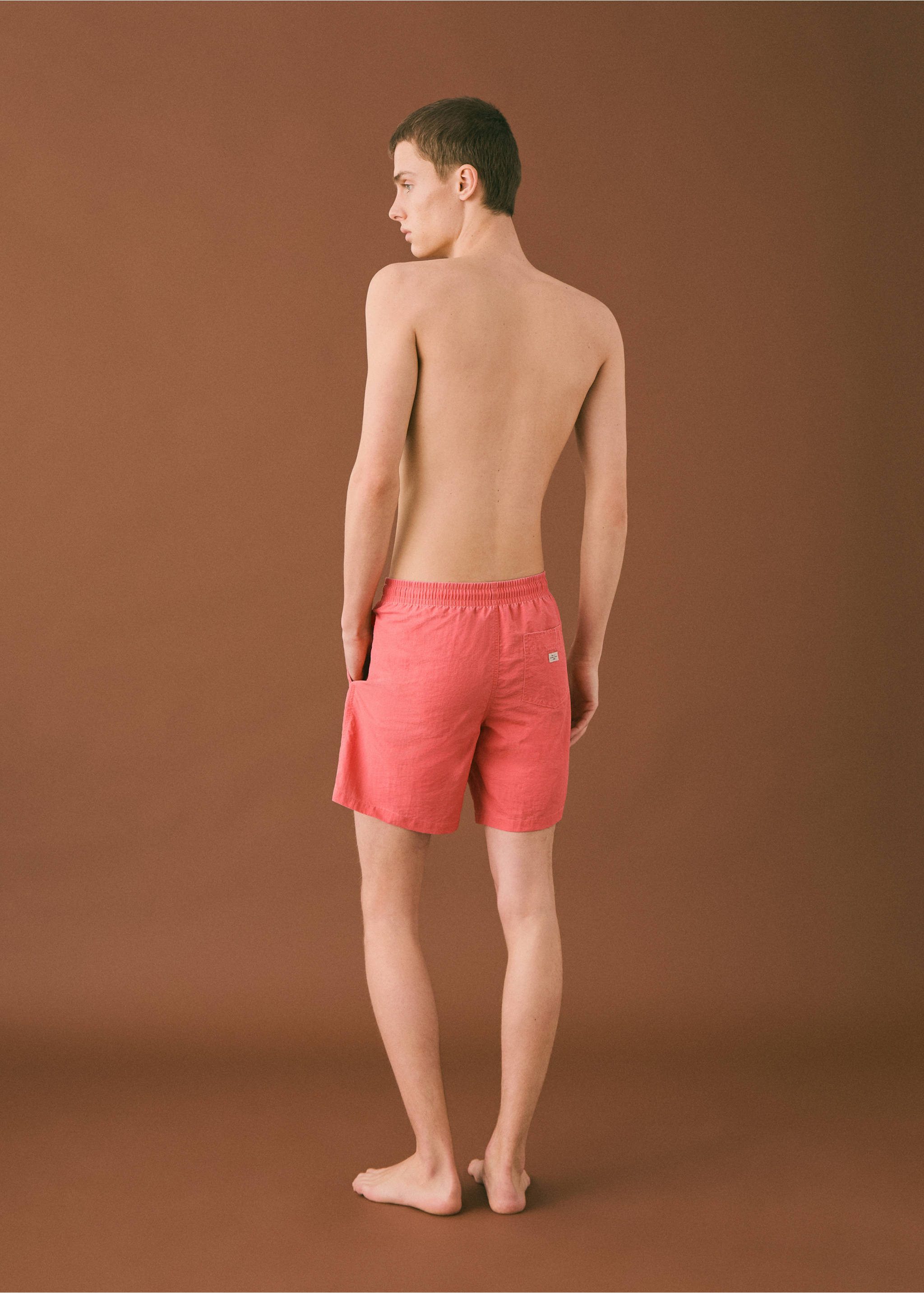 Textured lace swimsuit - Reverse of the article, Red. Ref: 87015956-00.