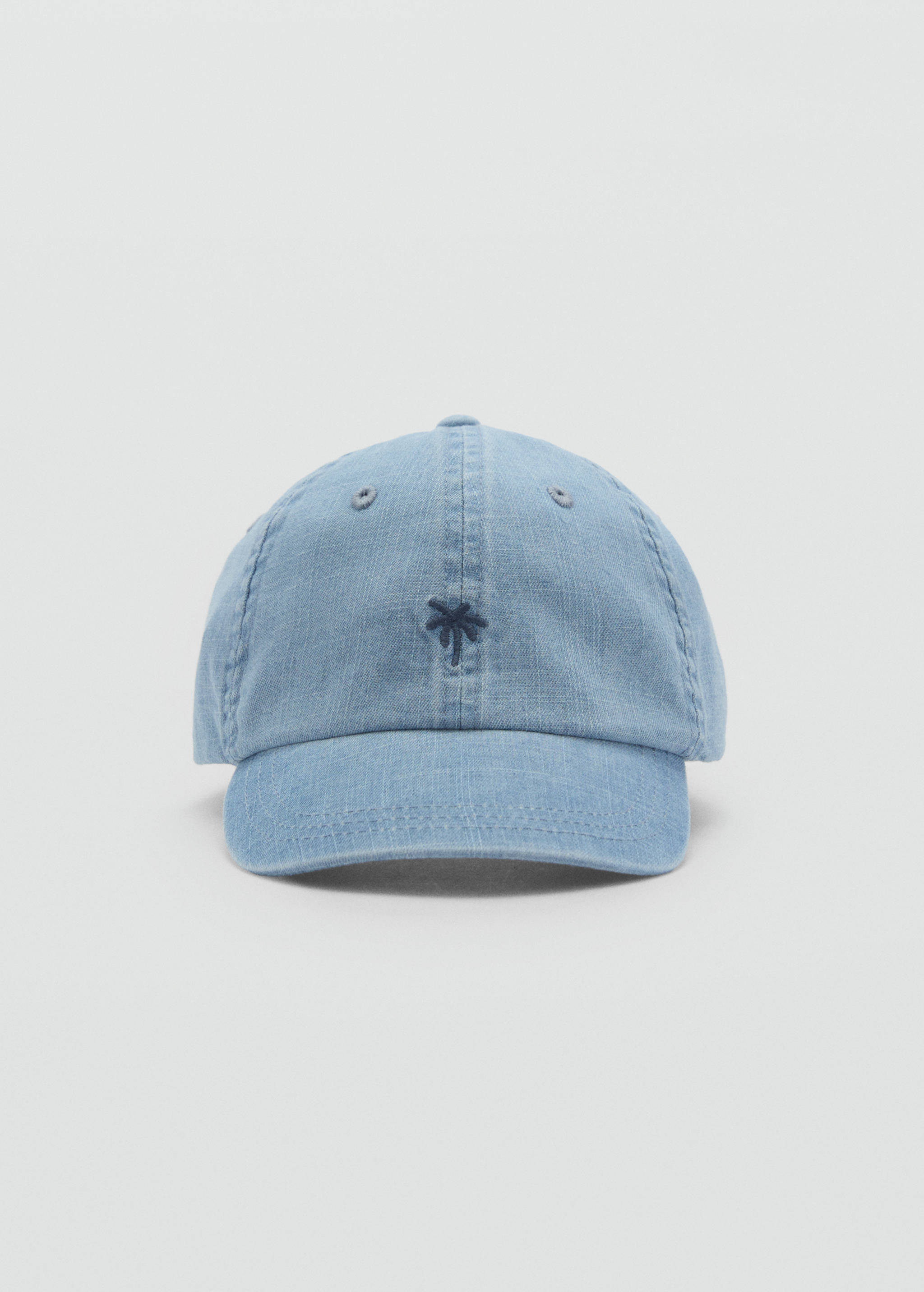 Caps i denim - Halvtotal bildeutsnitt