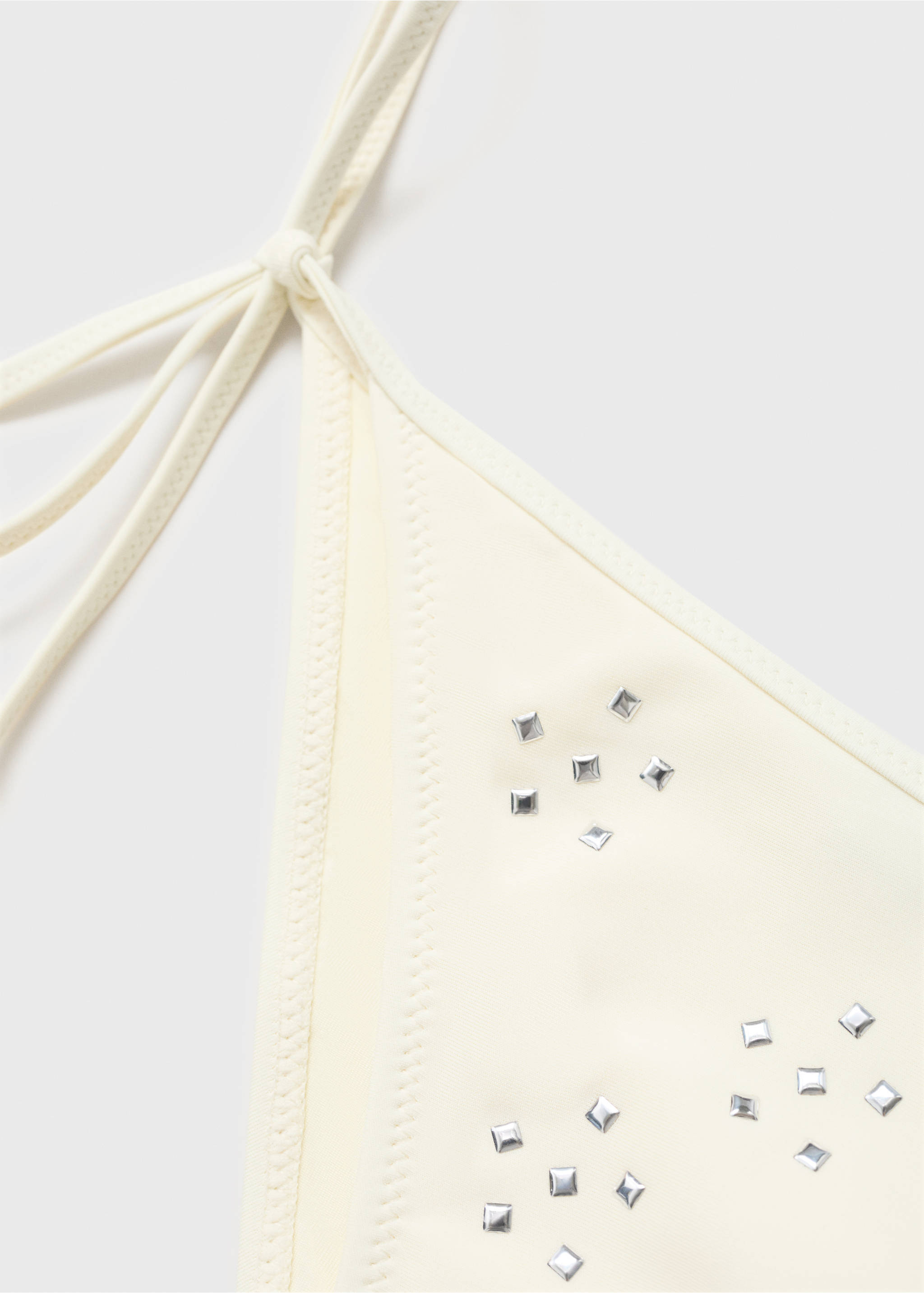 Bikini bottoms with metallic appliqués - Details of the article 8, Off White. Ref: 87019213-00.