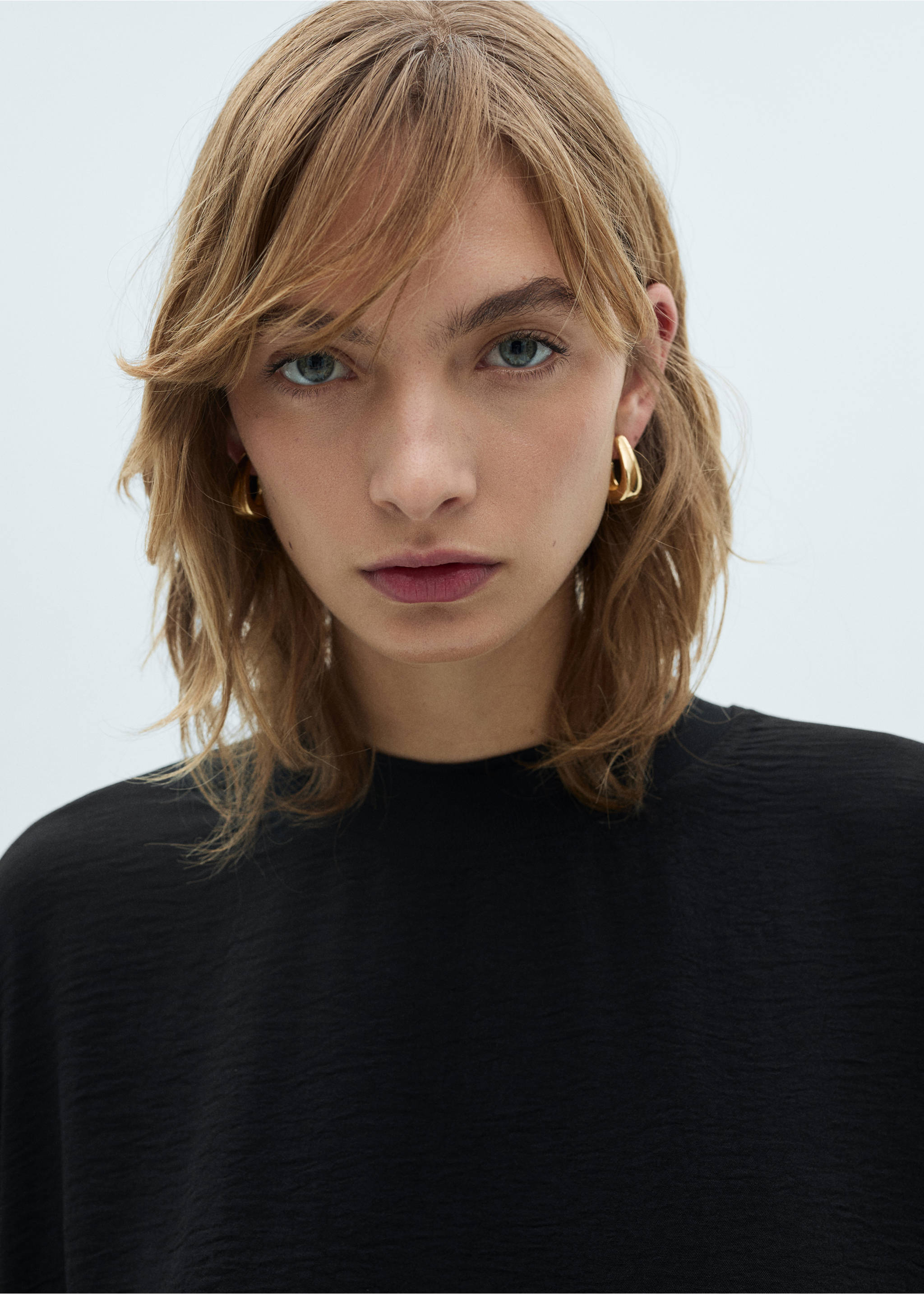 Dessuadora punt oversize - Detall de l'article 1, Negre. Ref: 87021047-00.