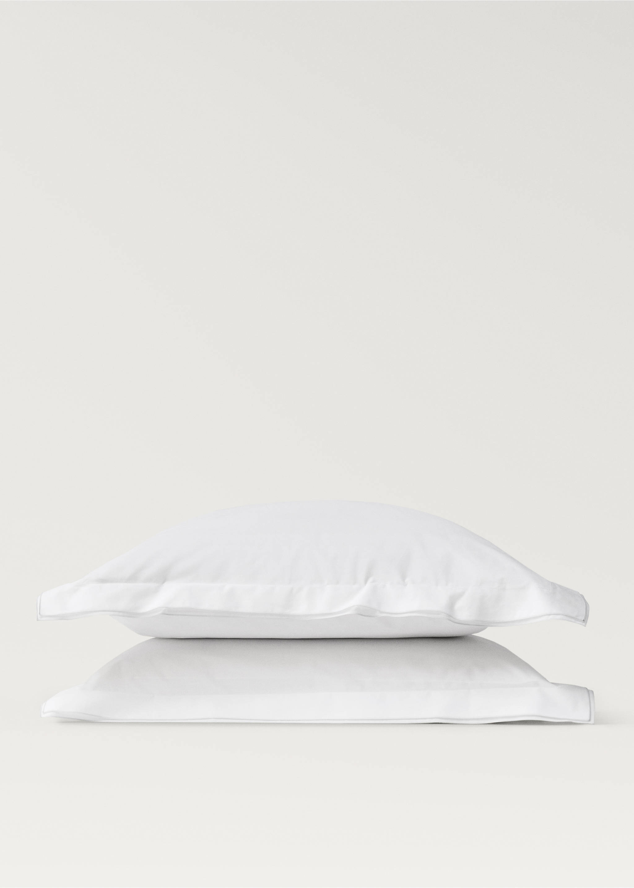 Two cotton percale pillowcases with double overlock 60x60 cm - Details of the article 1, Light/Pastel Grey. Ref: 87022971-00.